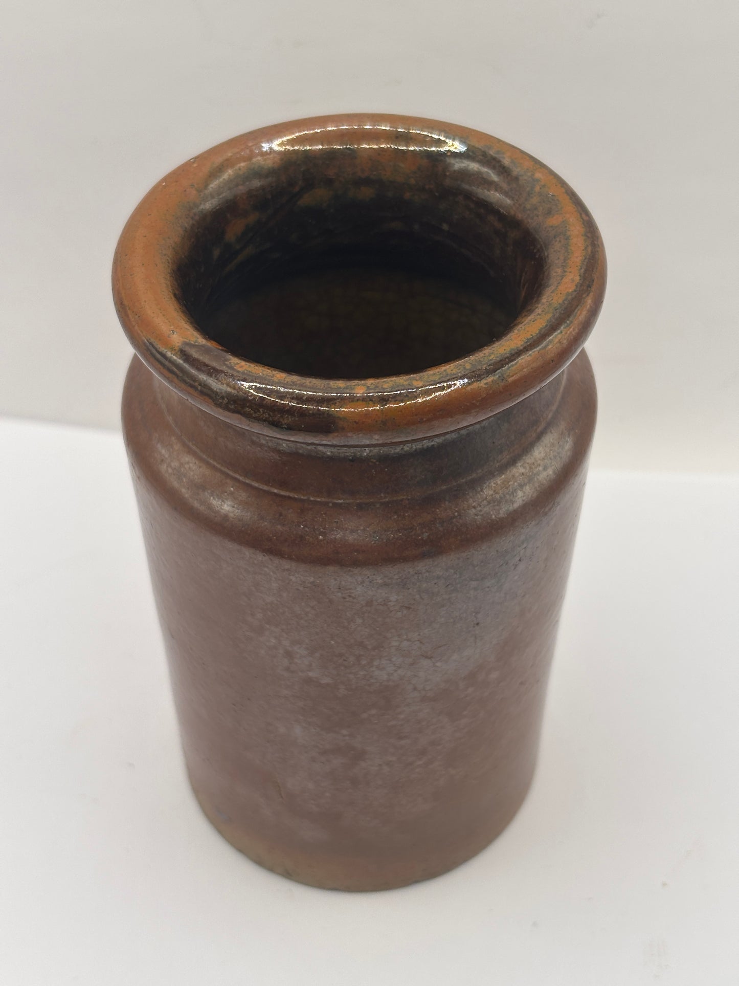 Old brown stoneware salt glaze jar