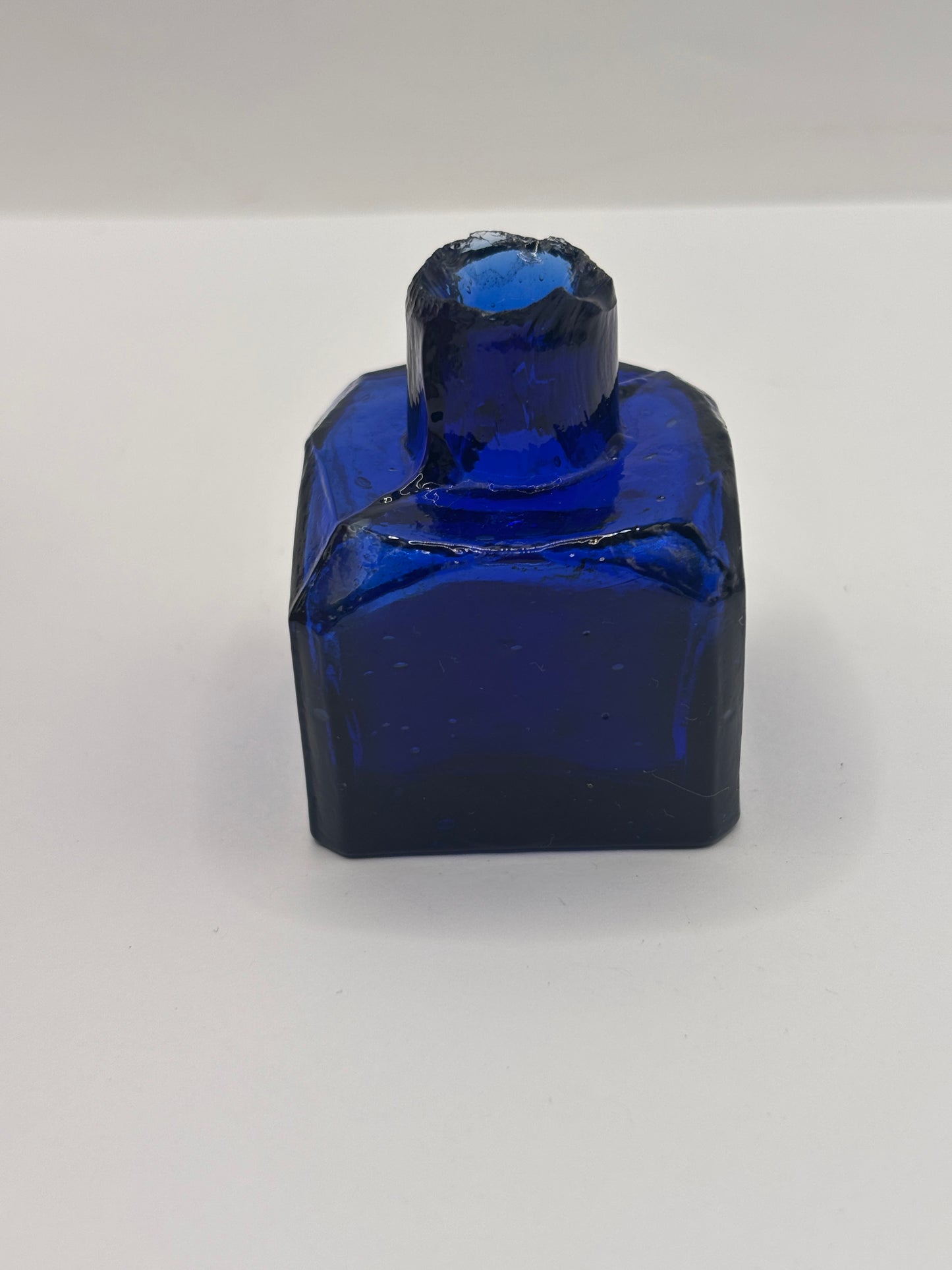 Old cobalt blue glass inkwell, ink bottle