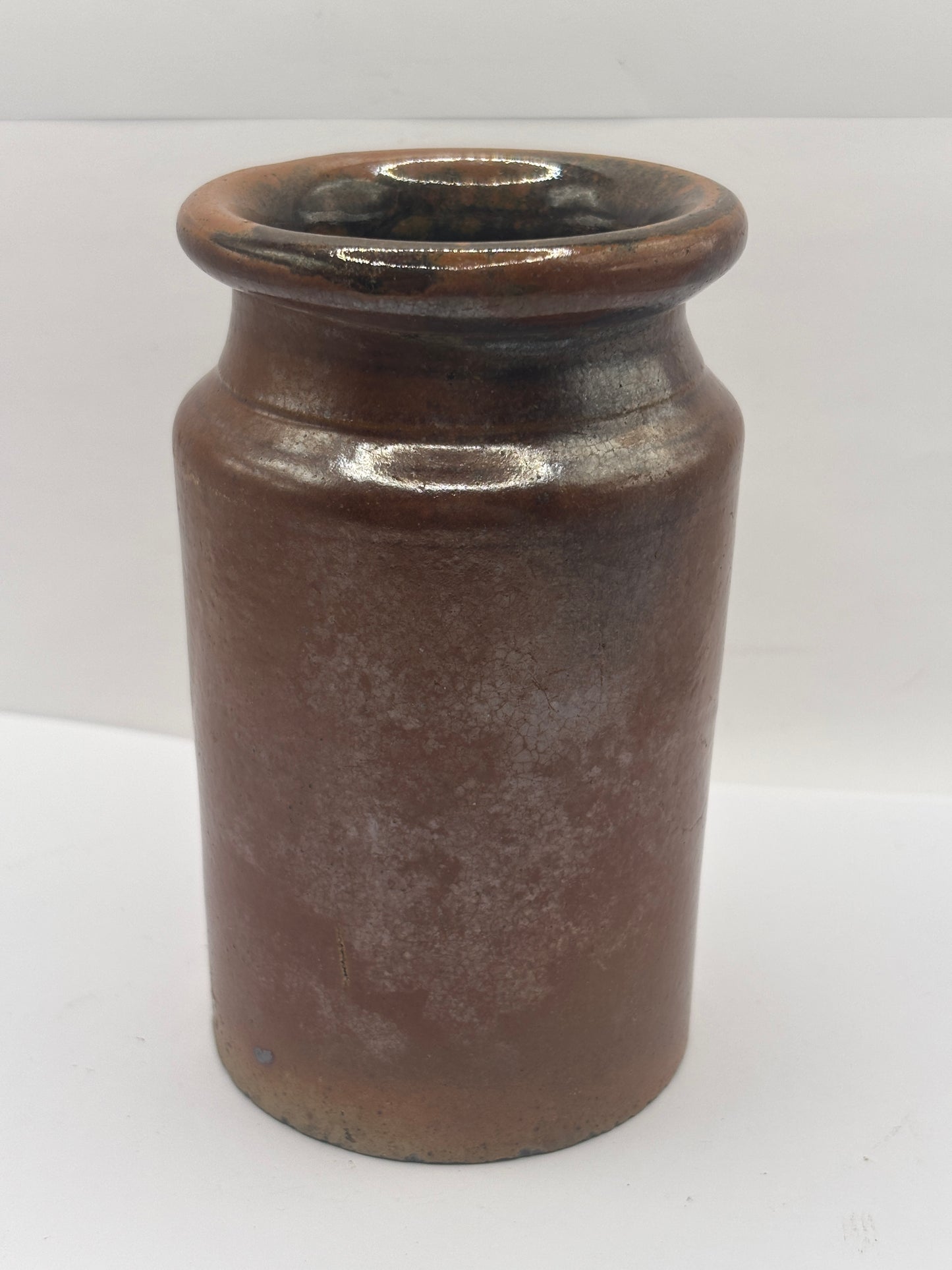 Old brown stoneware salt glaze jar