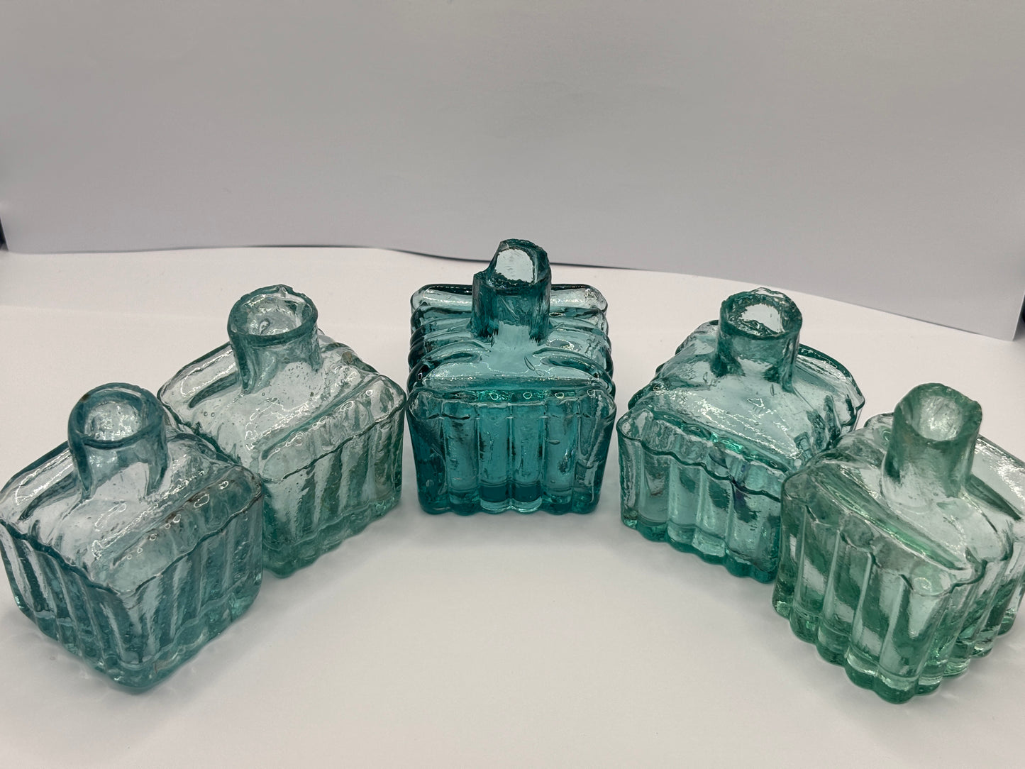 5 old aqua glass ribbed inkwells, ink bottles