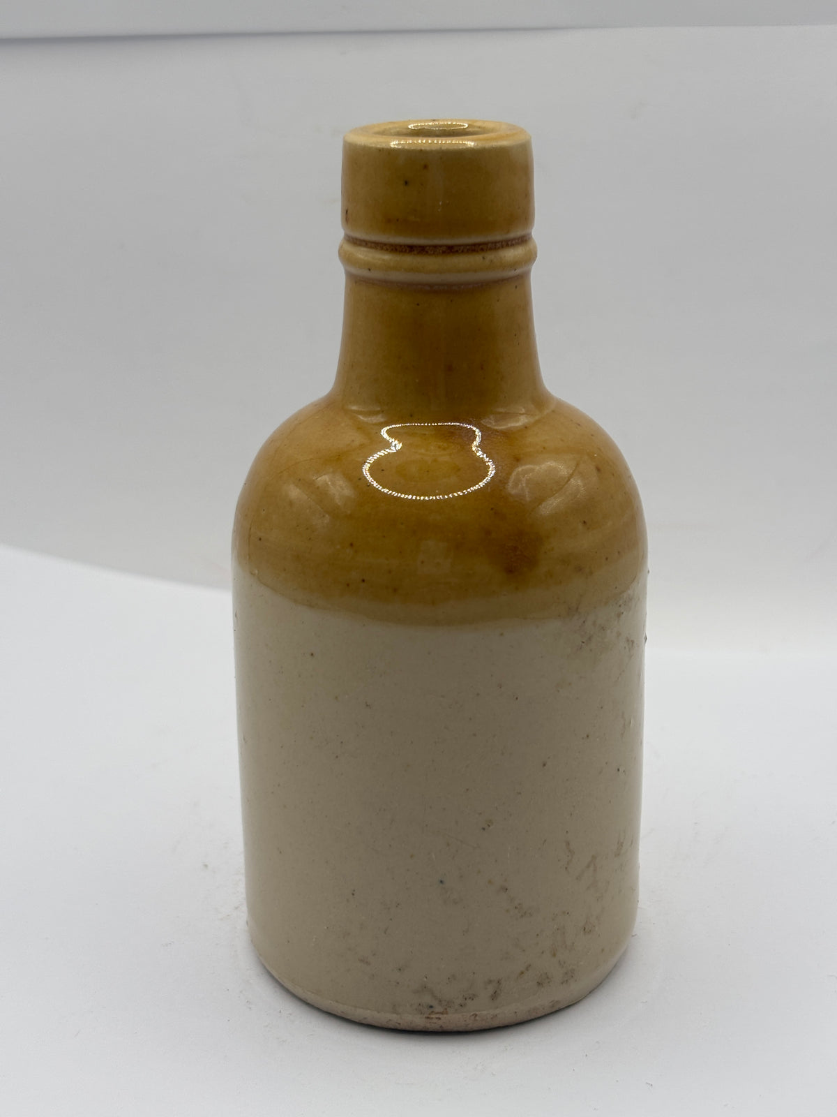 Old brown too stoneware bottle
