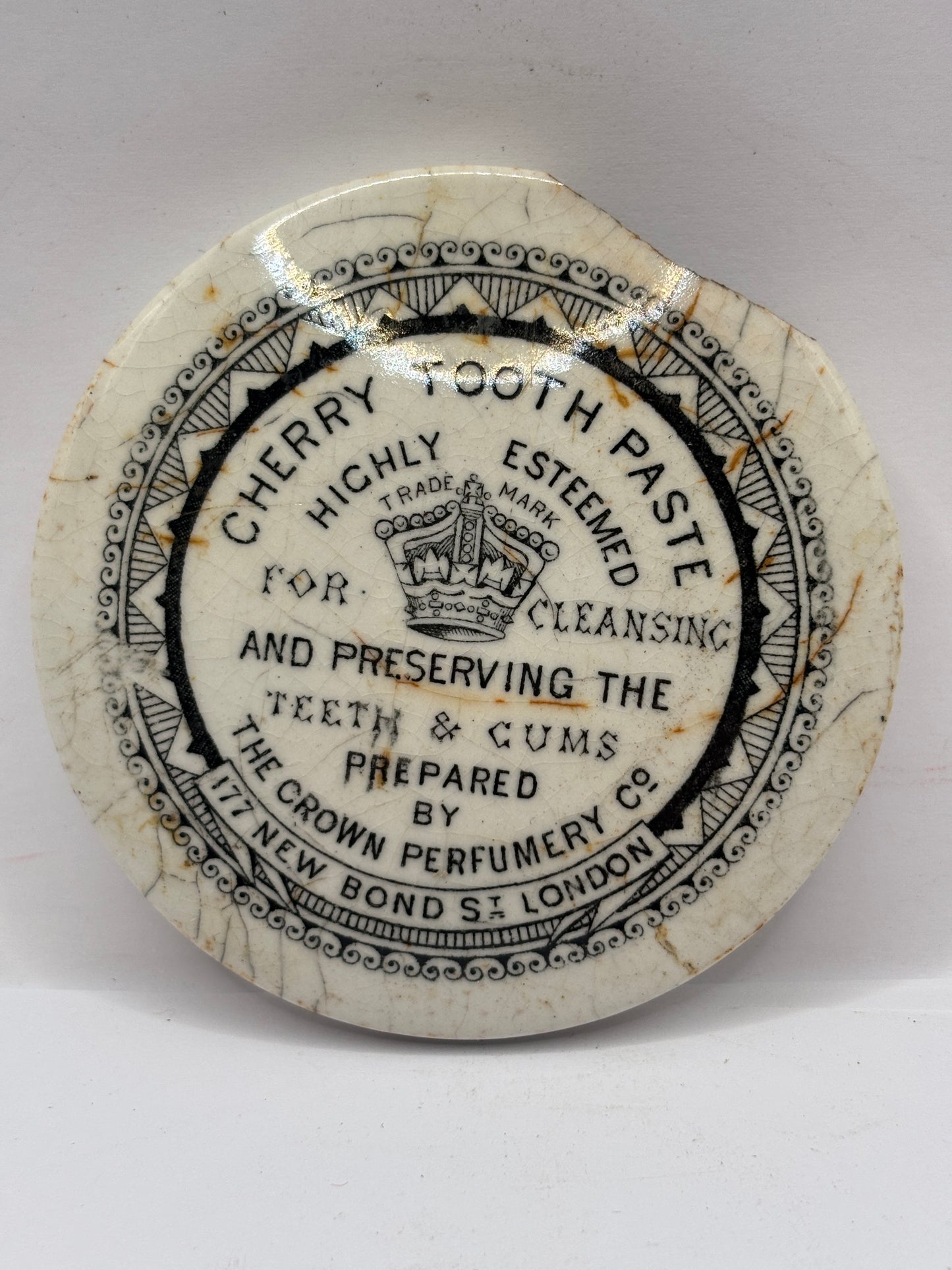 Old advertising lid, The crown perfumery. Damaged