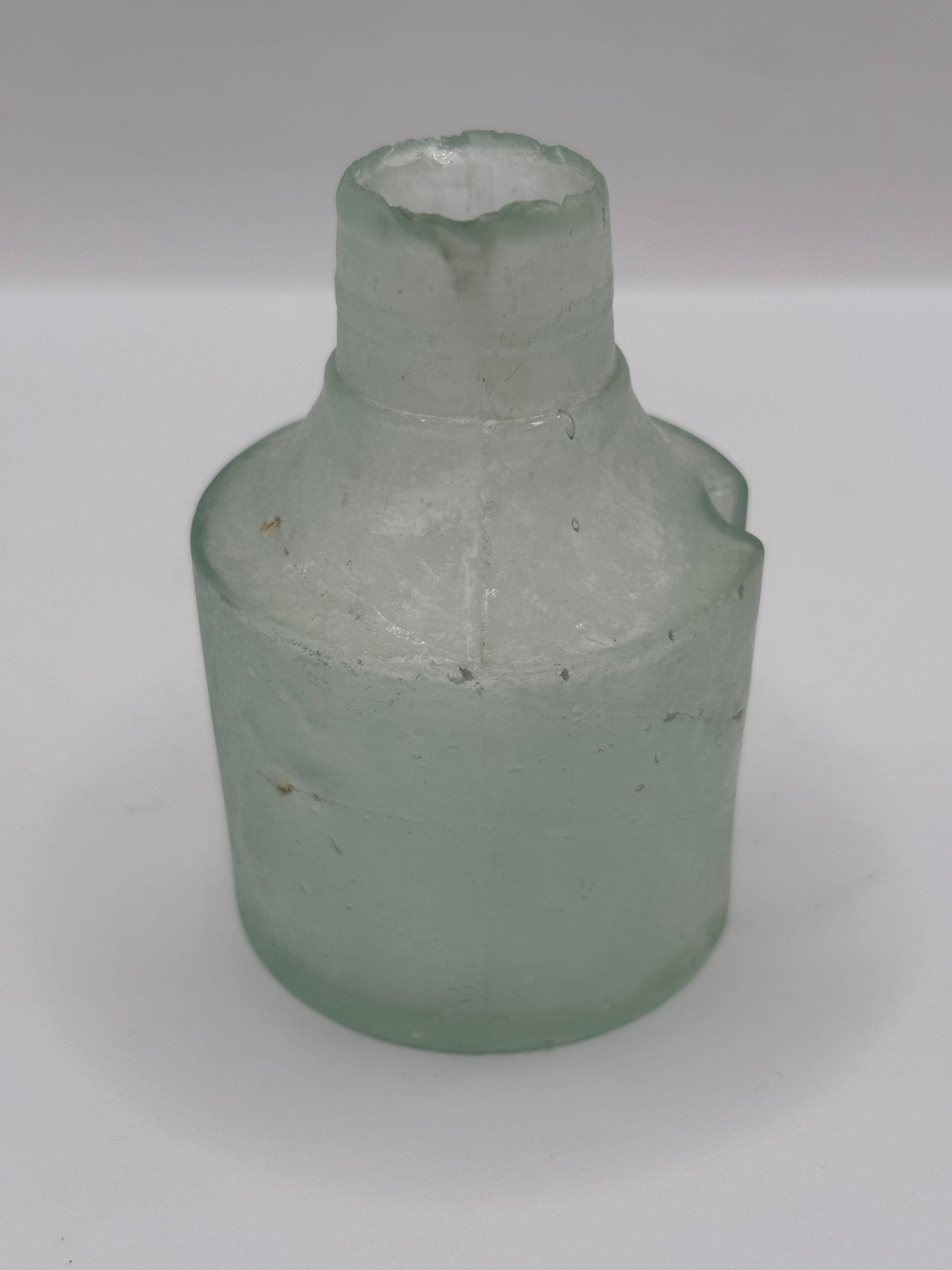 Old aqua glass inkwell, ink bottle with pen rest