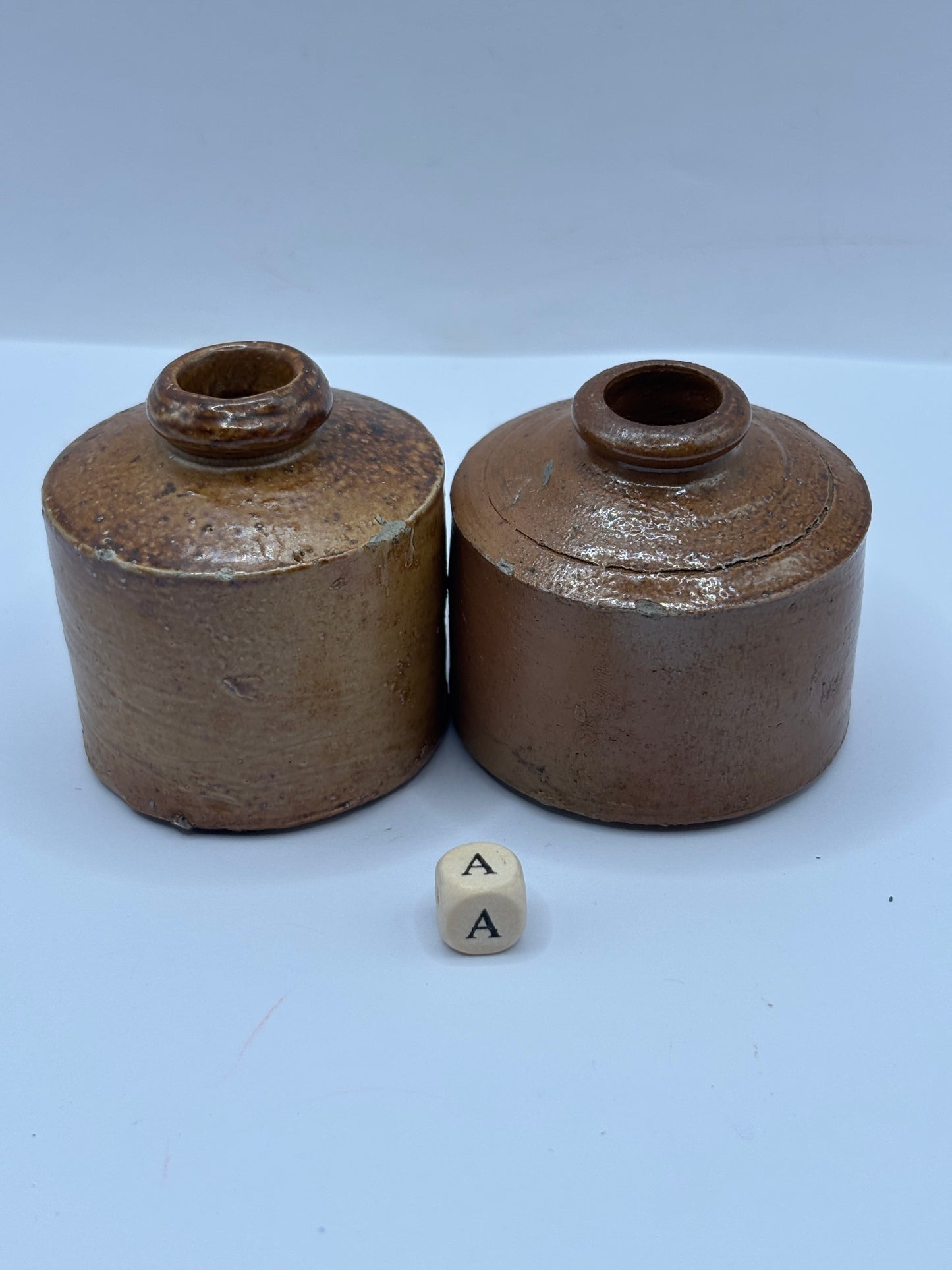 2 brown stoneware inkwells, ink bottles (a) pork pie inks