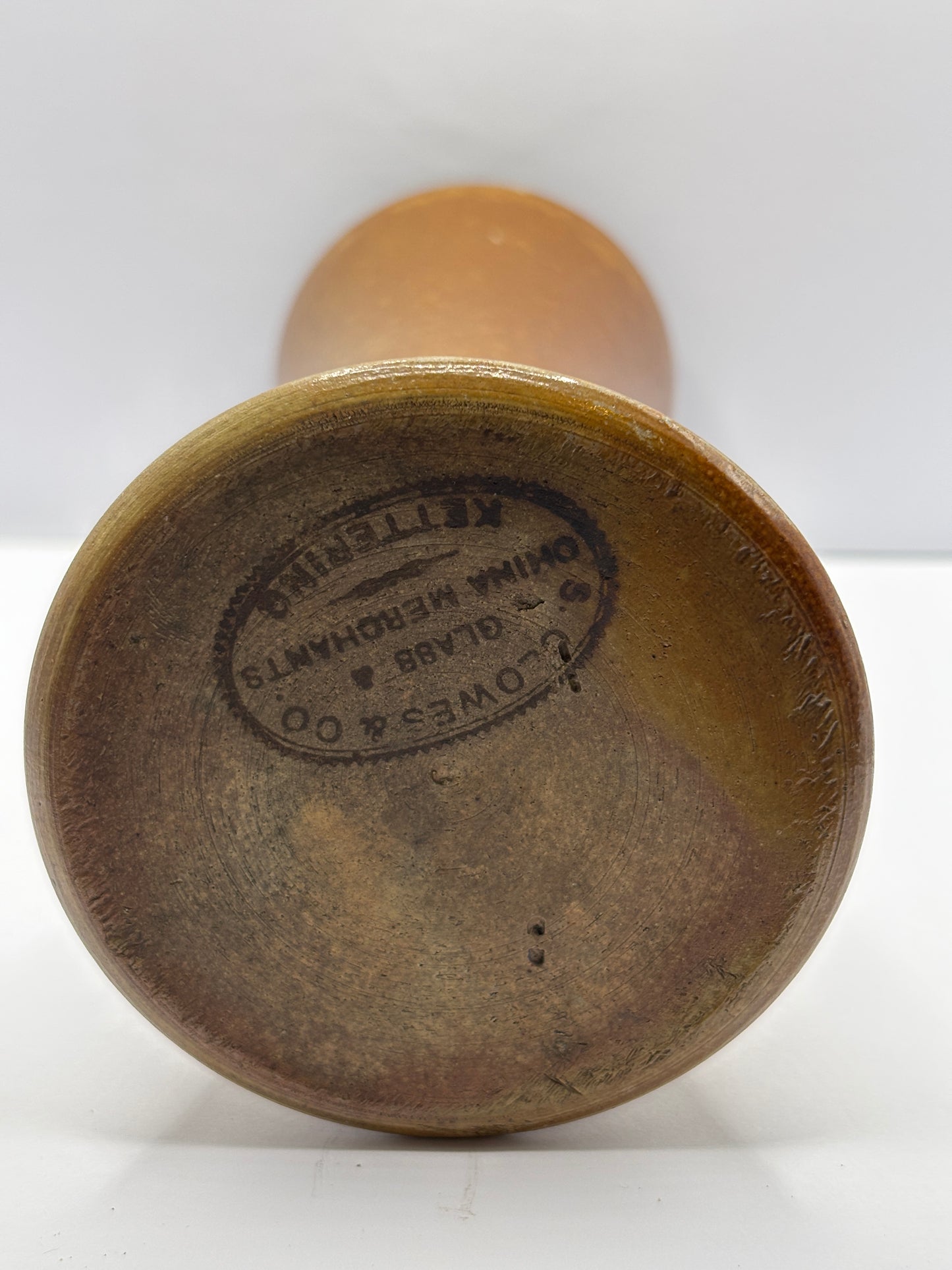 Old brown stoneware vase