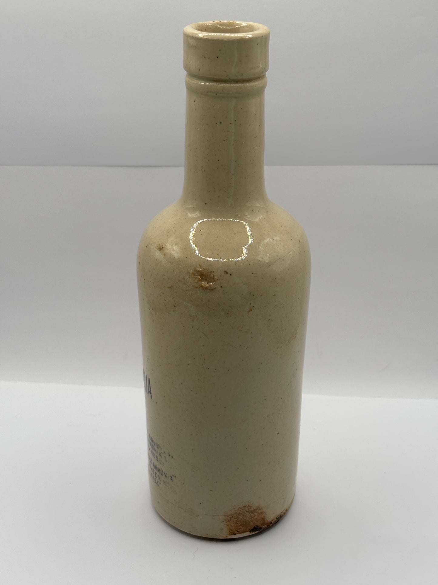 Old advertising stoneware bottle, Plynine household ammonia. Small size 21.5cms