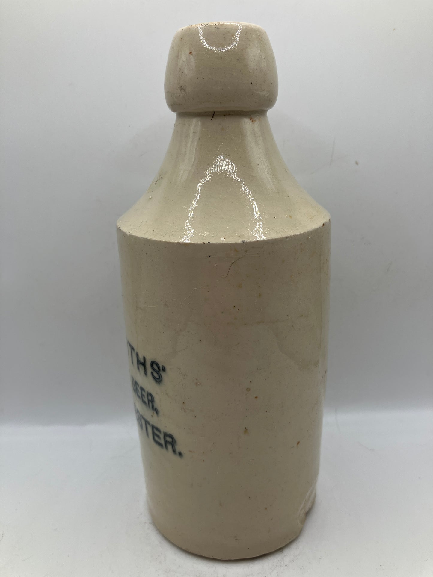 White stoneware ginger beer bottle, Cirencester