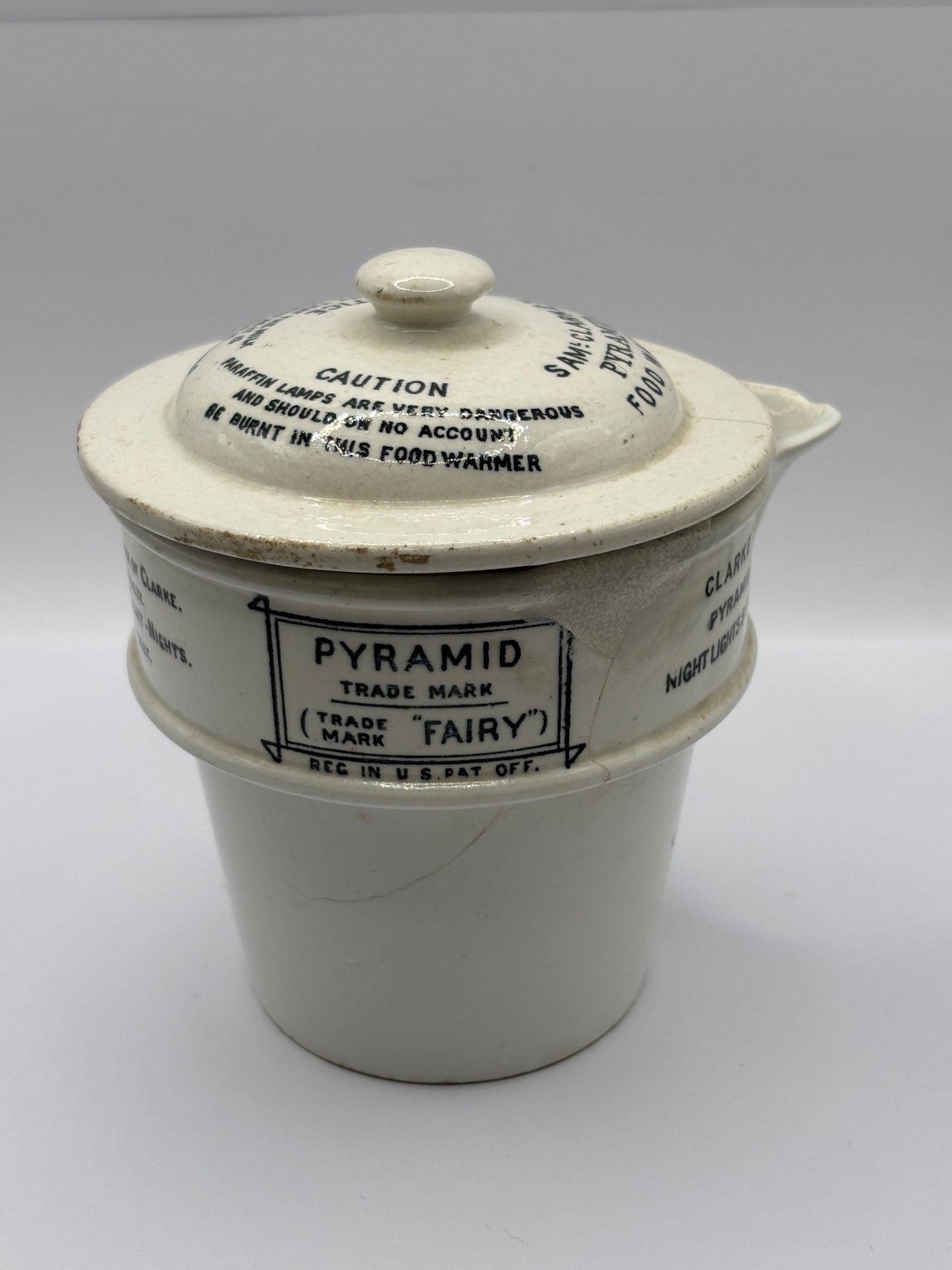 Old stoneware advertising food warmer. Clarkes Pyramid food warmer. Damaged/repaired