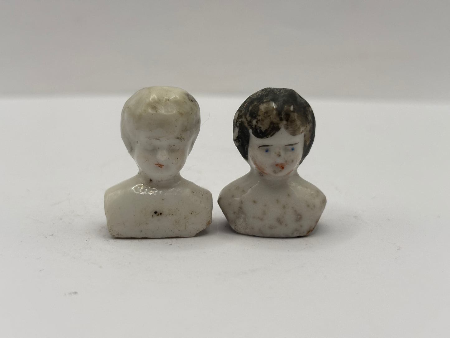 2 old miniature dolls heads