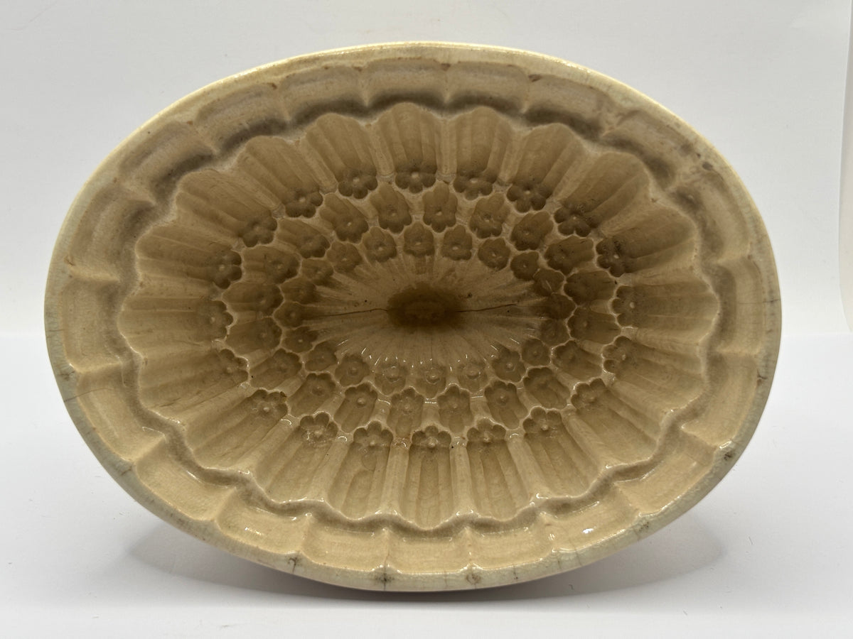 Old stained & crazed jelly mould