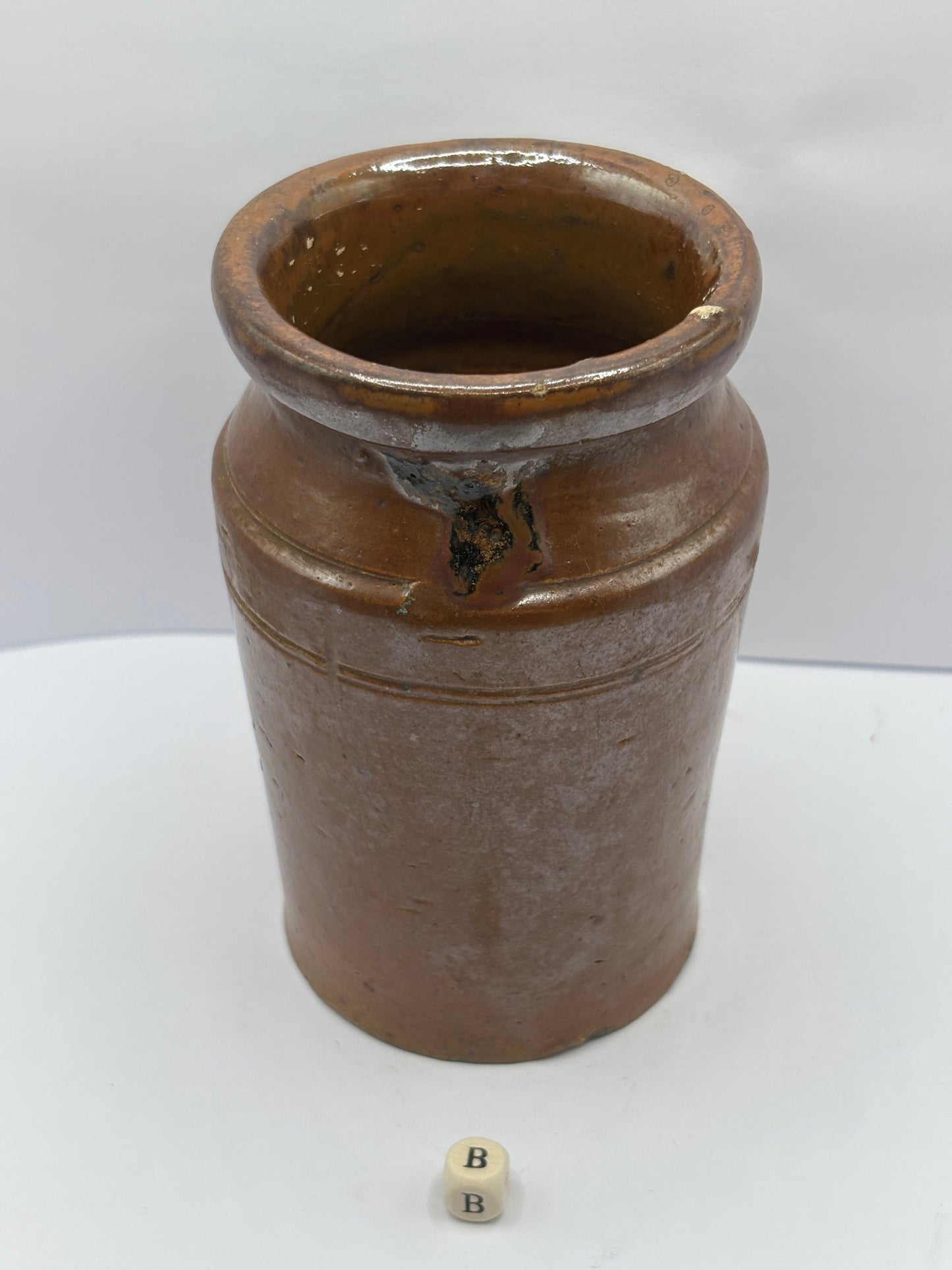 Old brown stoneware jar (B)
