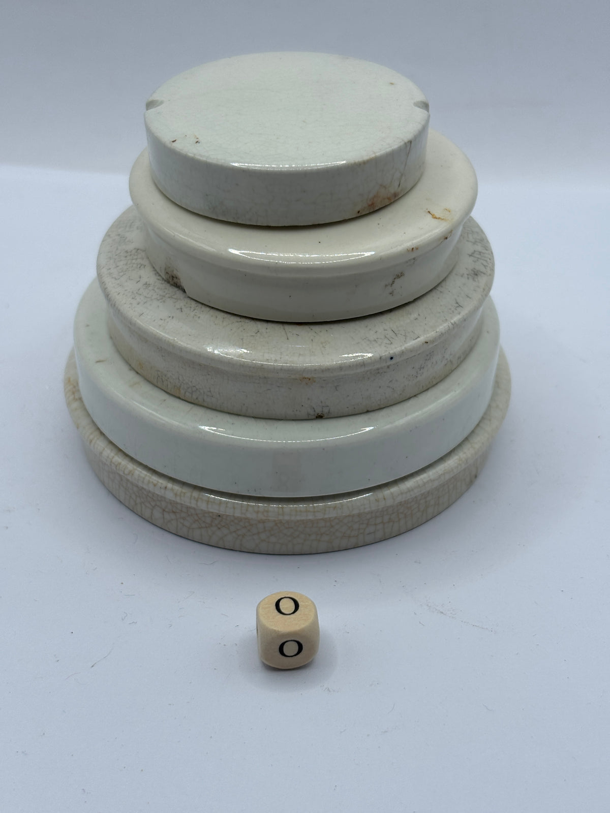 5 old stoneware lids, stackers (o)