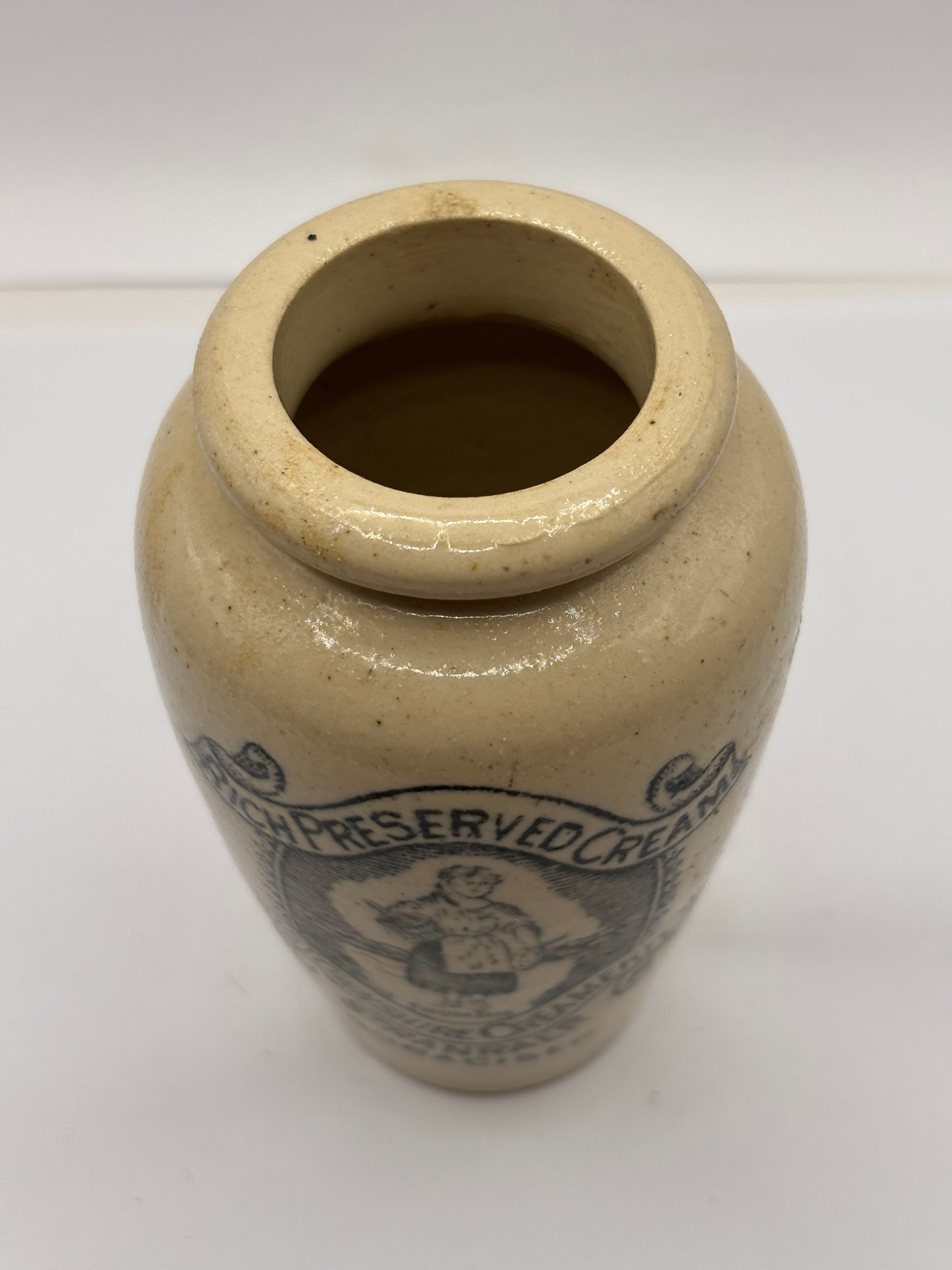 Old stoneware advertising cream pot, pure fresh cream Stranraer. Milk maid
