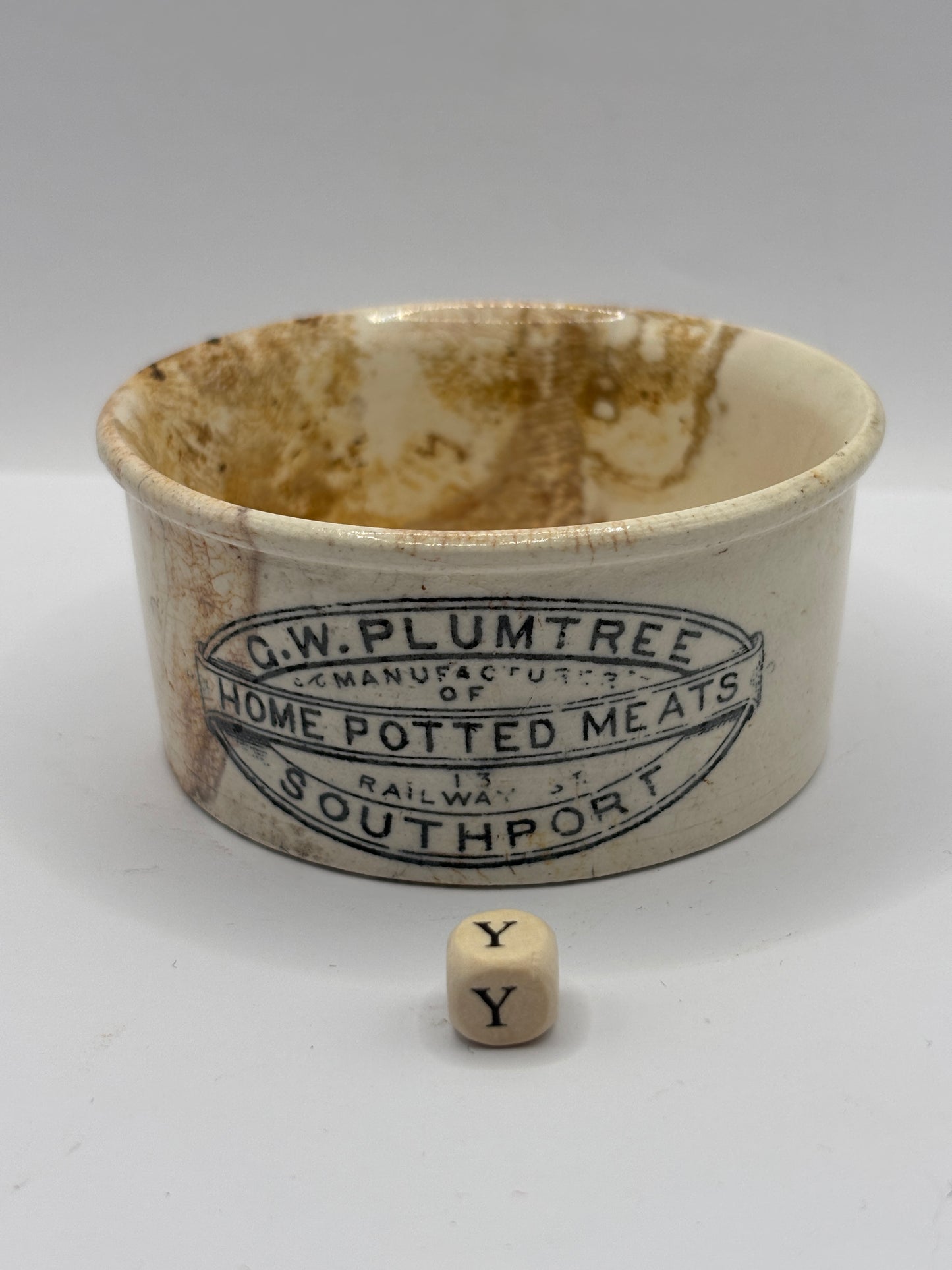 Old Plumtree advertising meat paste pot. Stained & crazed (Y)