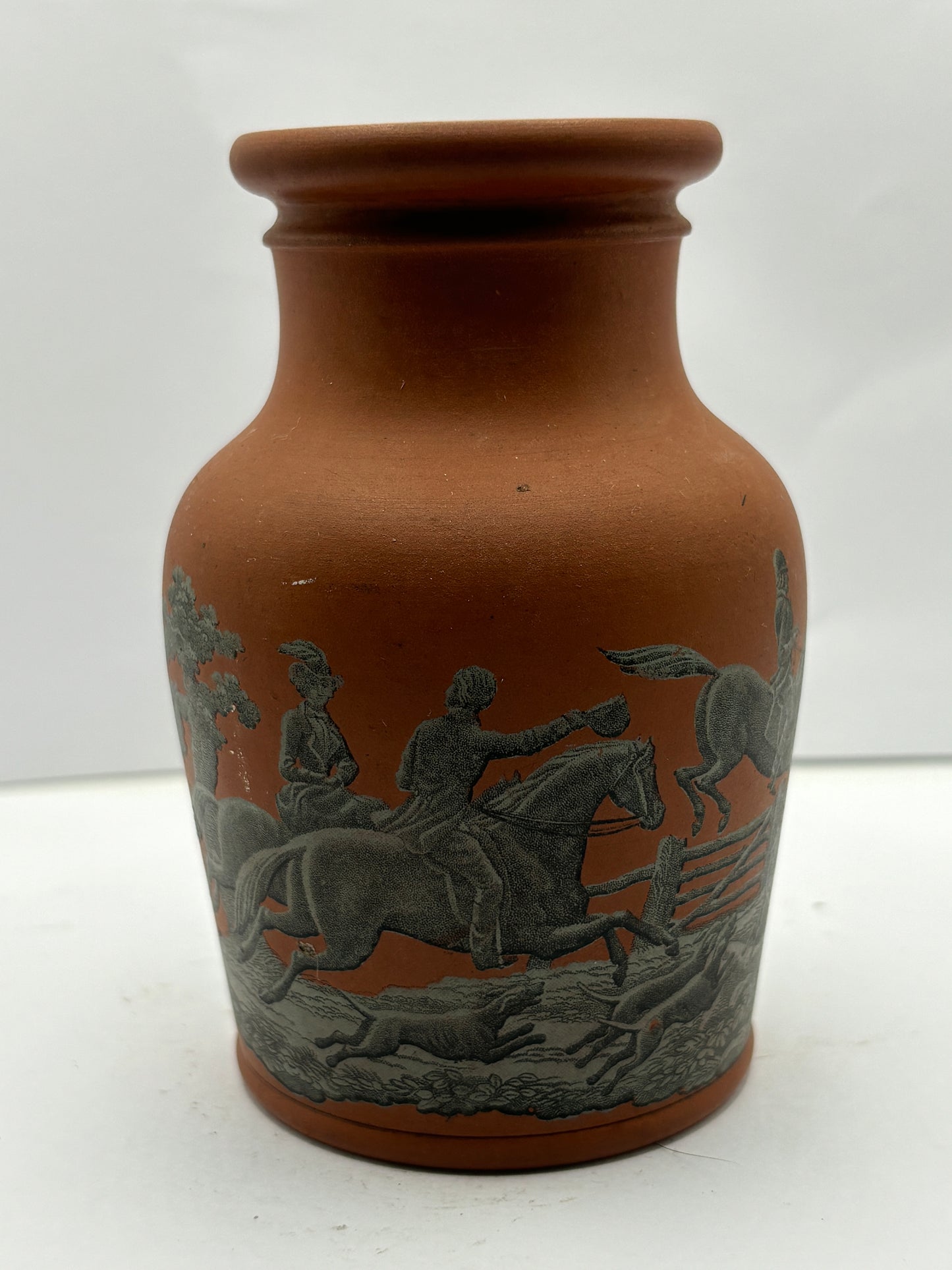 Brown prattware jar, hunting dogs