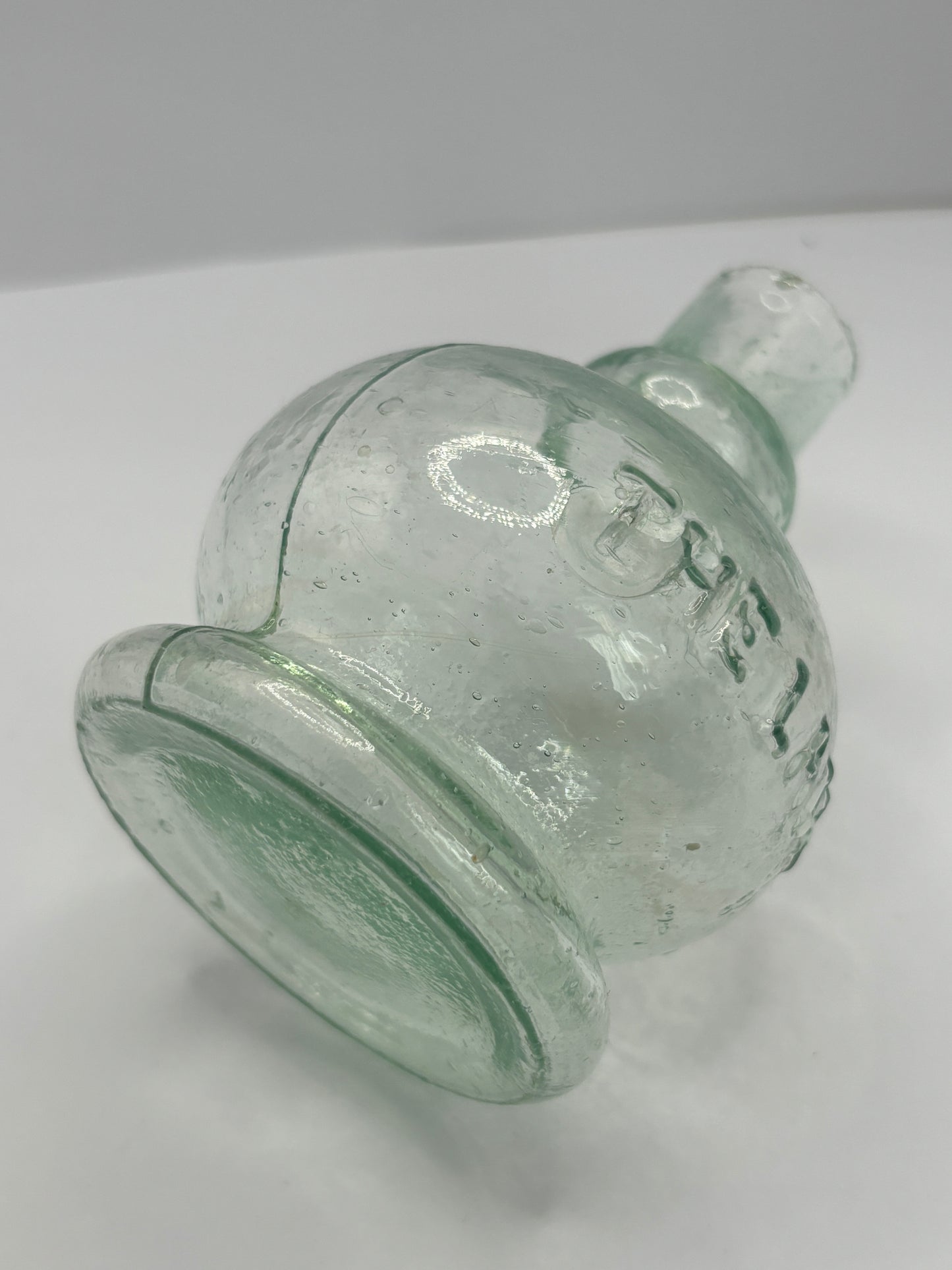 Small aqua glass oil lamp. The Lamp