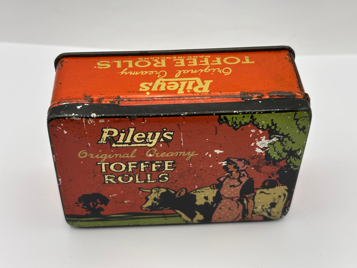 Old advertising tin, Rileys original creamy toffee rolls