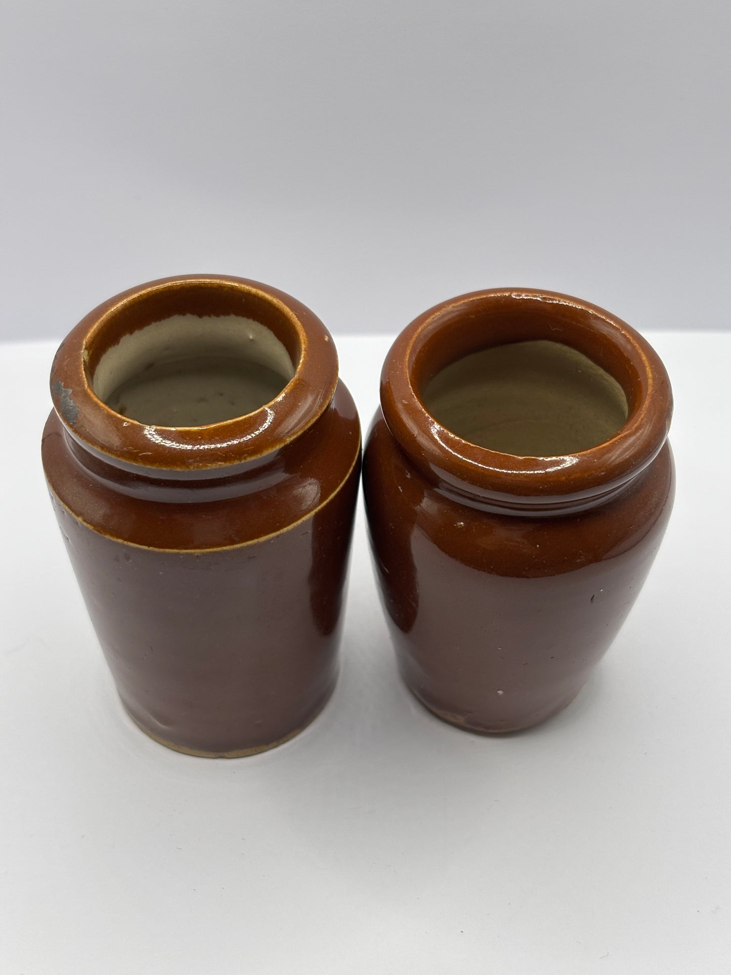2 Old brown stoneware cream pots