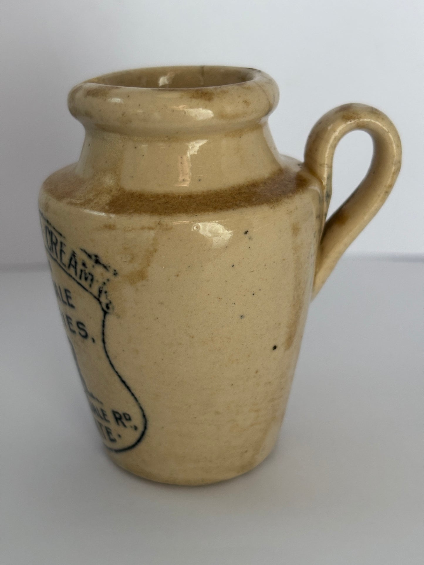 Old Nidderdale advertising cream pot, 7.5cms