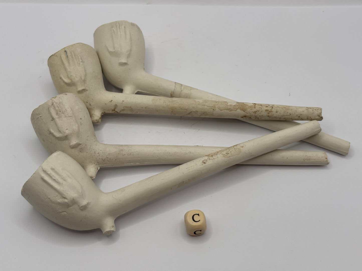 4 clay pipes (c)