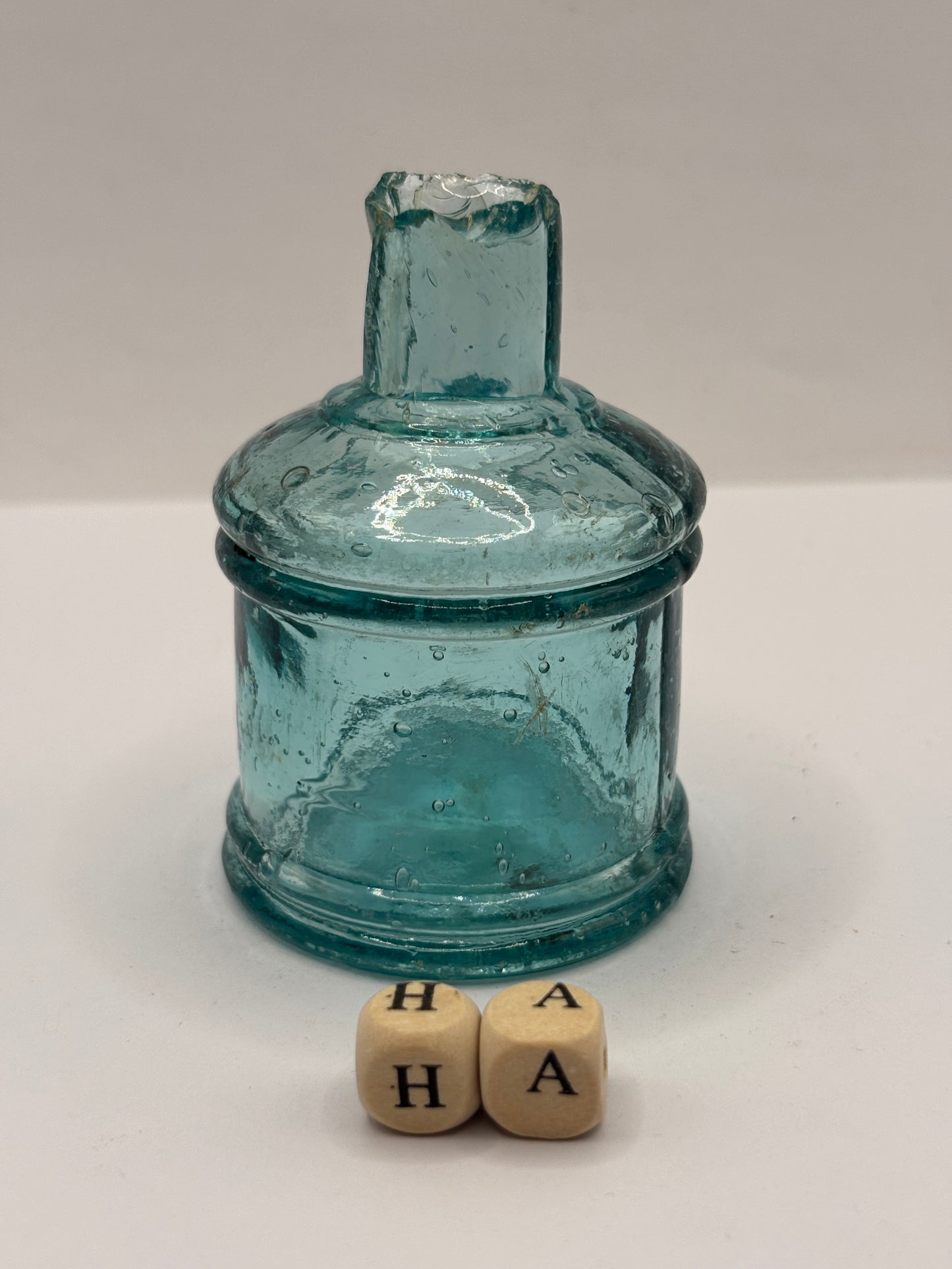 Old dark aqua glass inkwell, penny ink, ink bottle (HA)