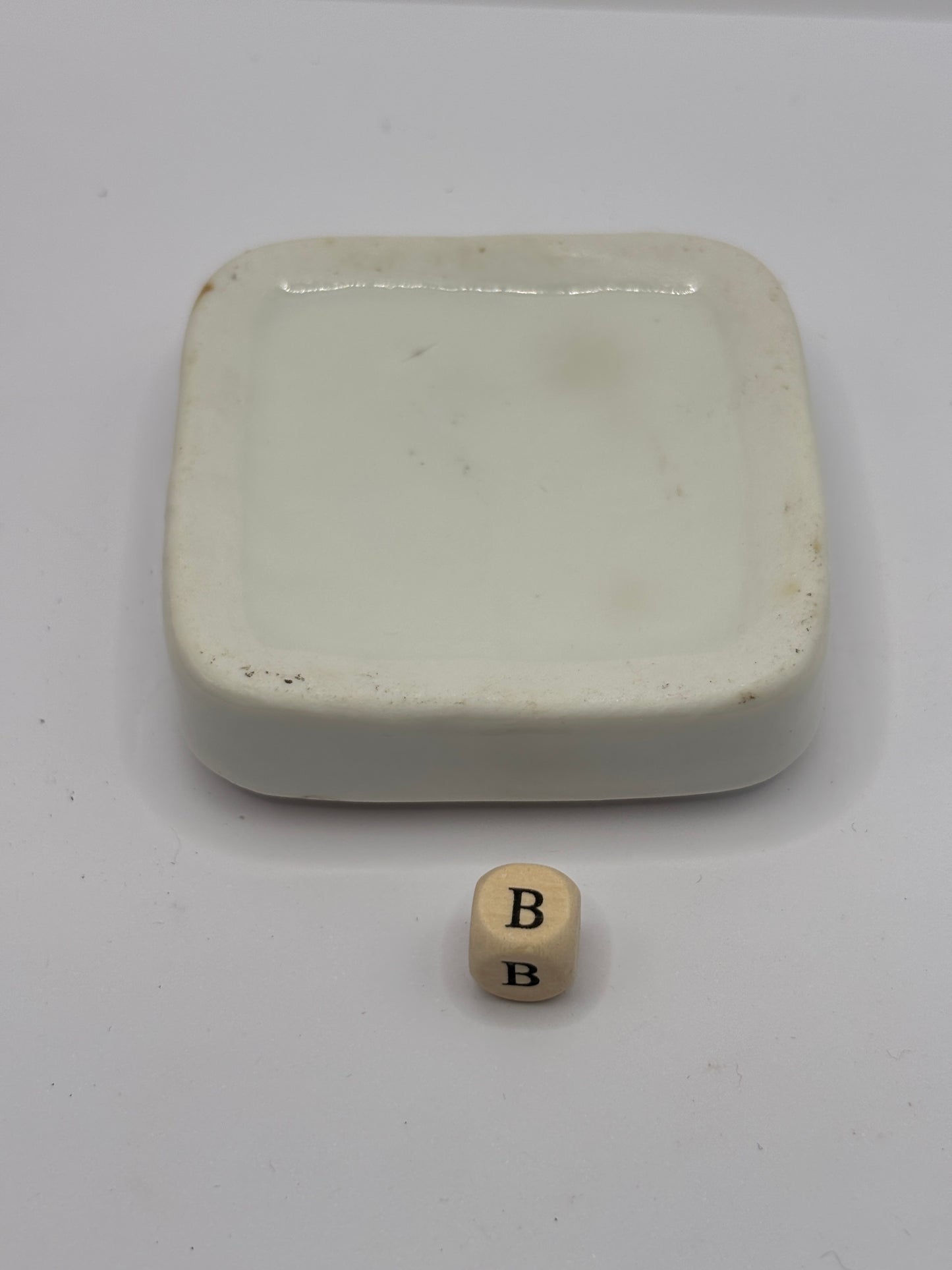 Old square pot lid base, stacker (B)