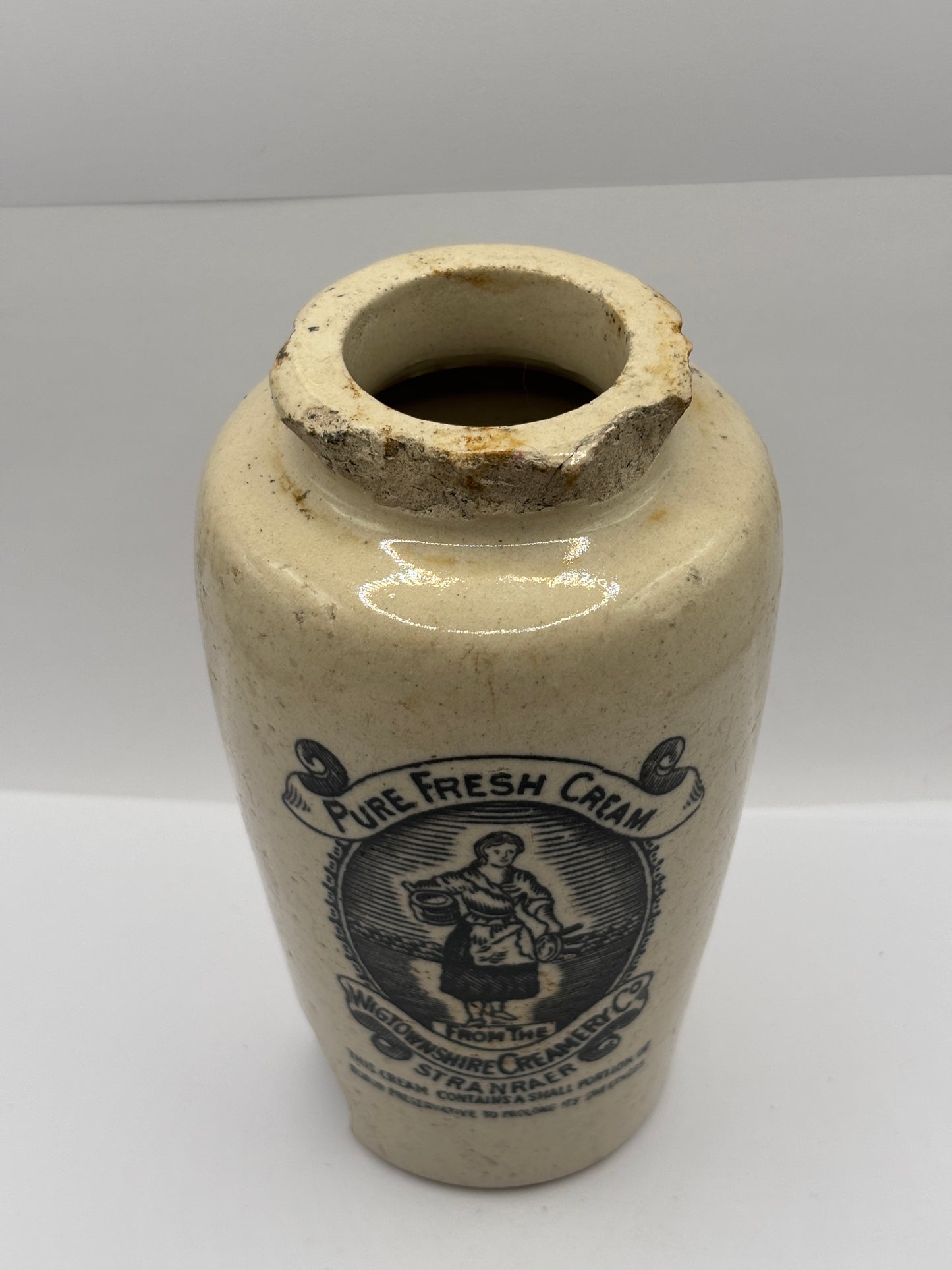 Old tall stoneware advertising cream pot, pure fresh cream Stranraer. Damaged