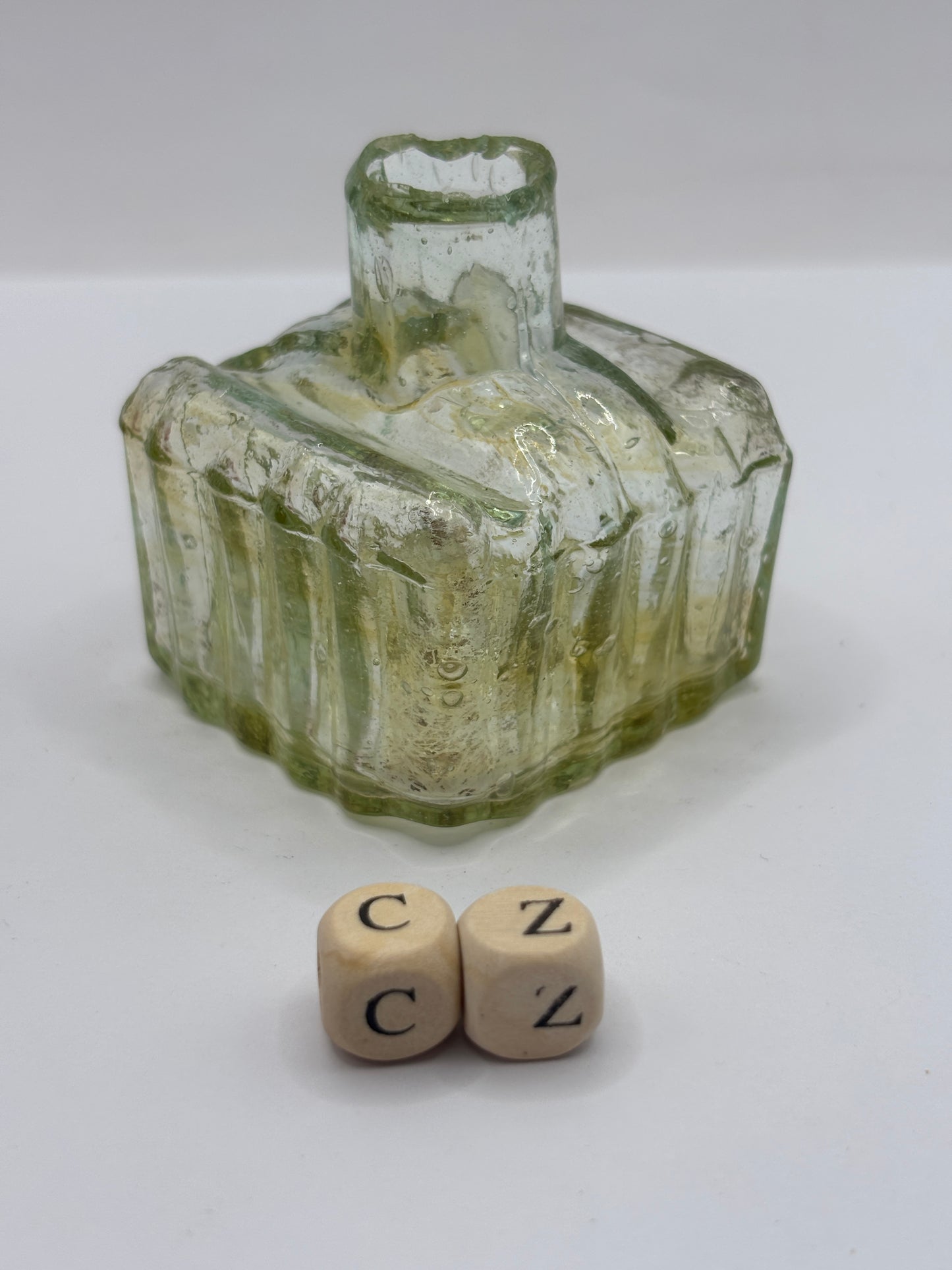 Old glass inkwell with swirls, penny ink, ink bottle (cz)