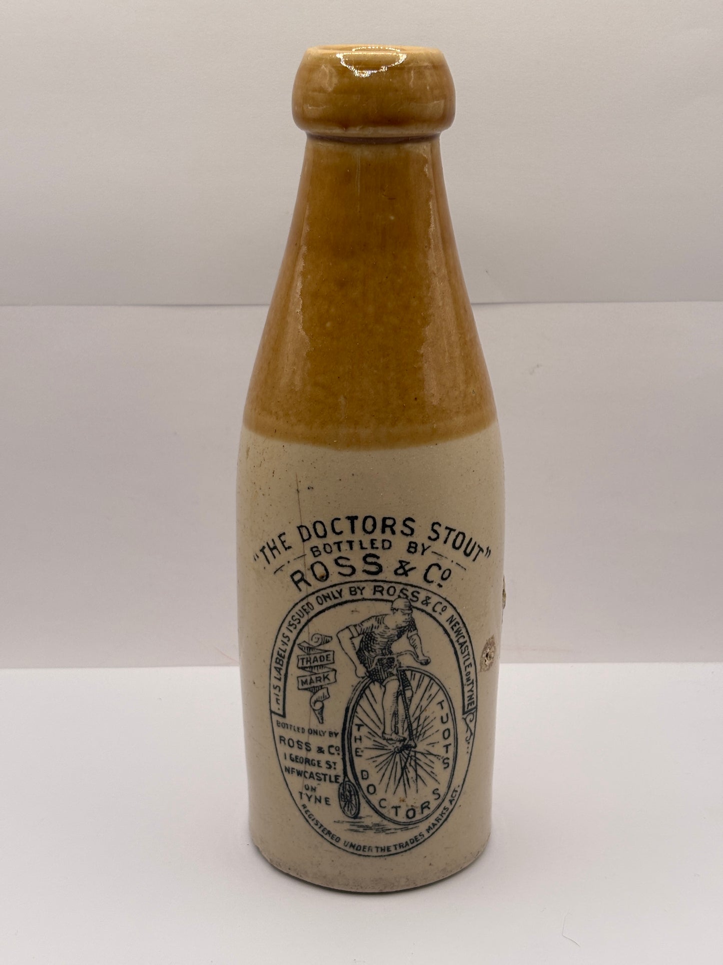 Old stoneware stout bottle, The Doctors stout, Ross & Co. Hairline