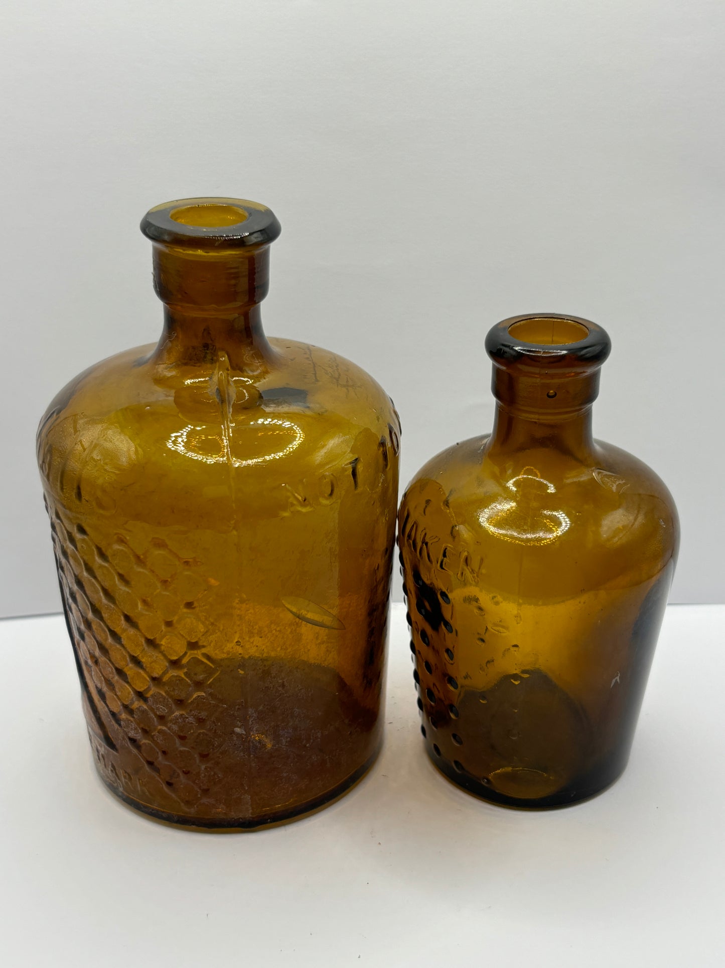 2 amber glass lysol bottles