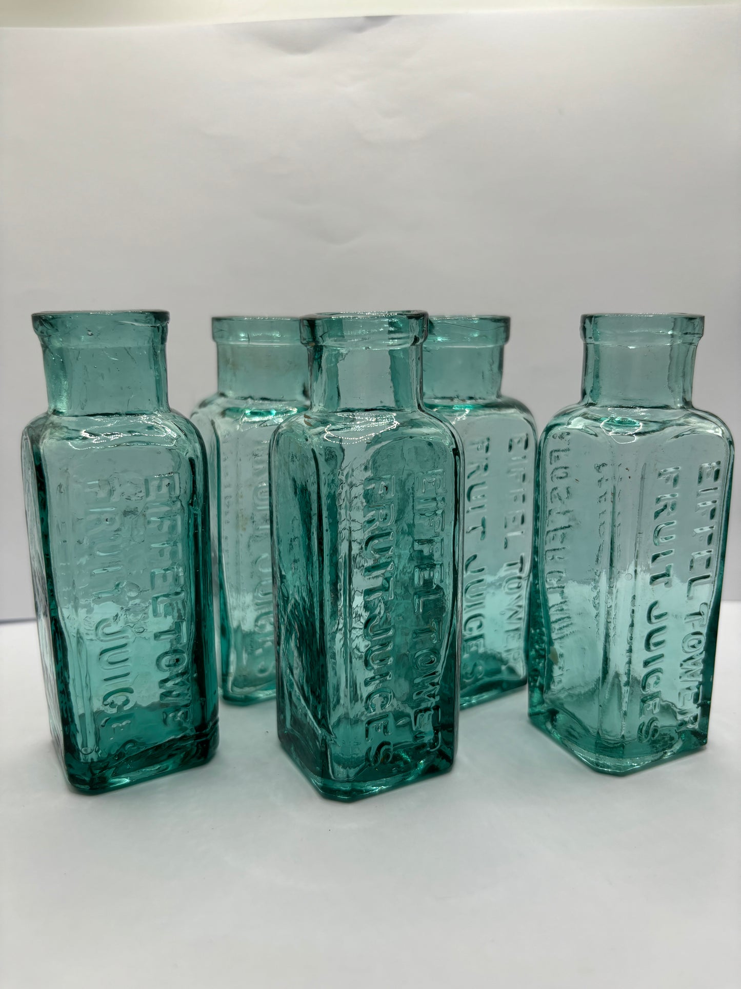 5 old aqua glass eiffel tower lemonade bottles