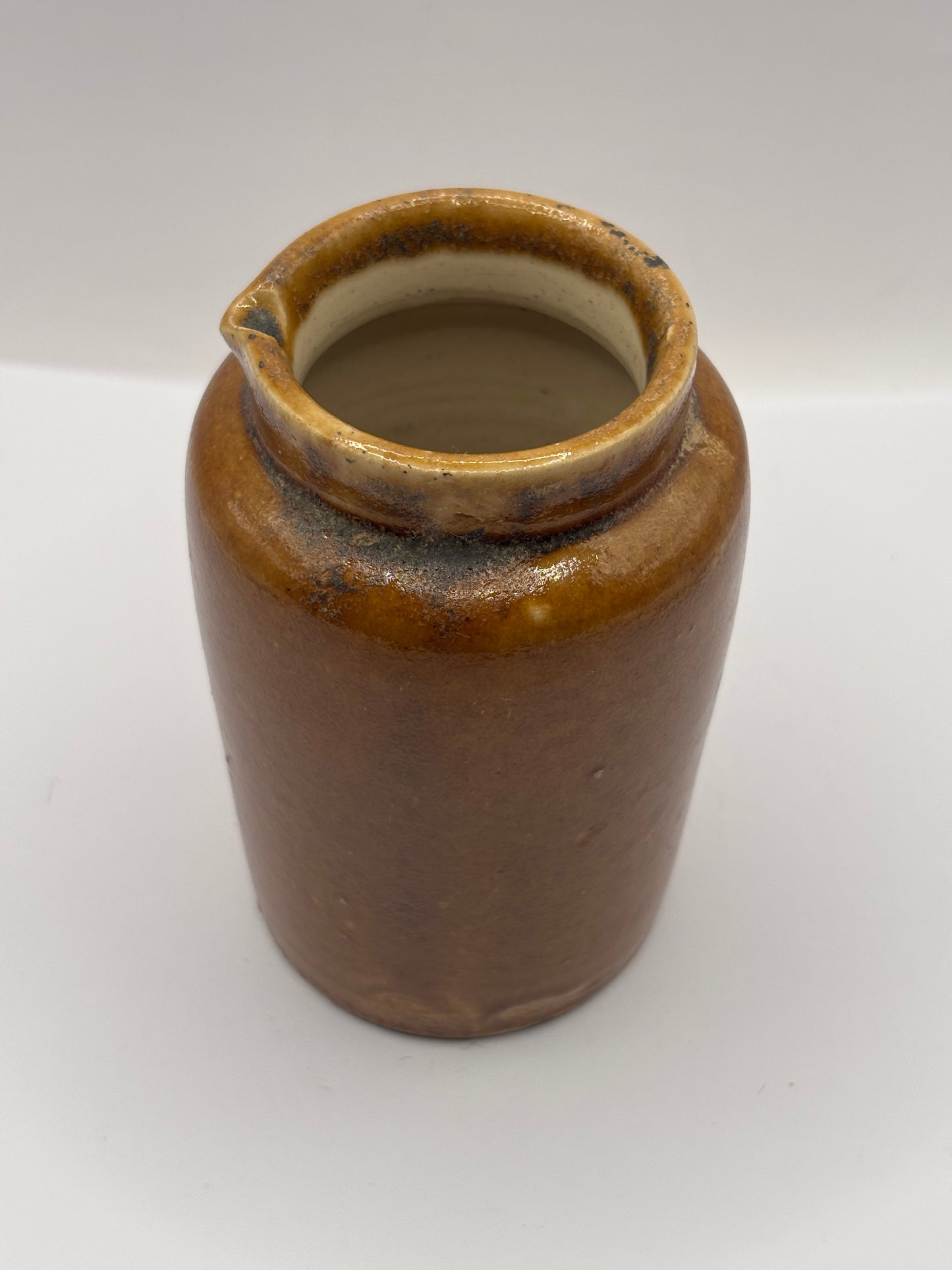 Old plain brown stoneware cream pot