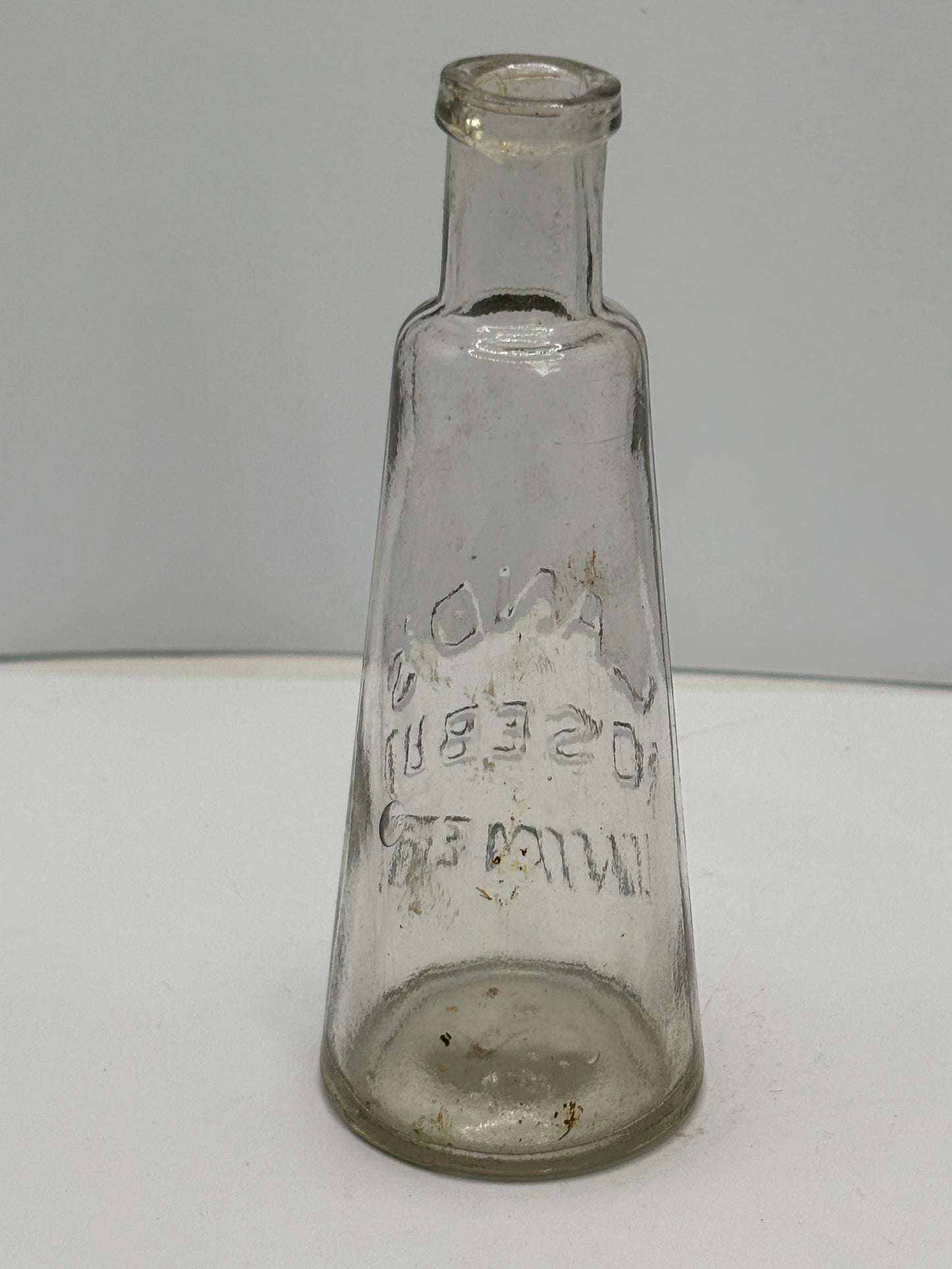 Old Land’s Rosebud liniment bottle