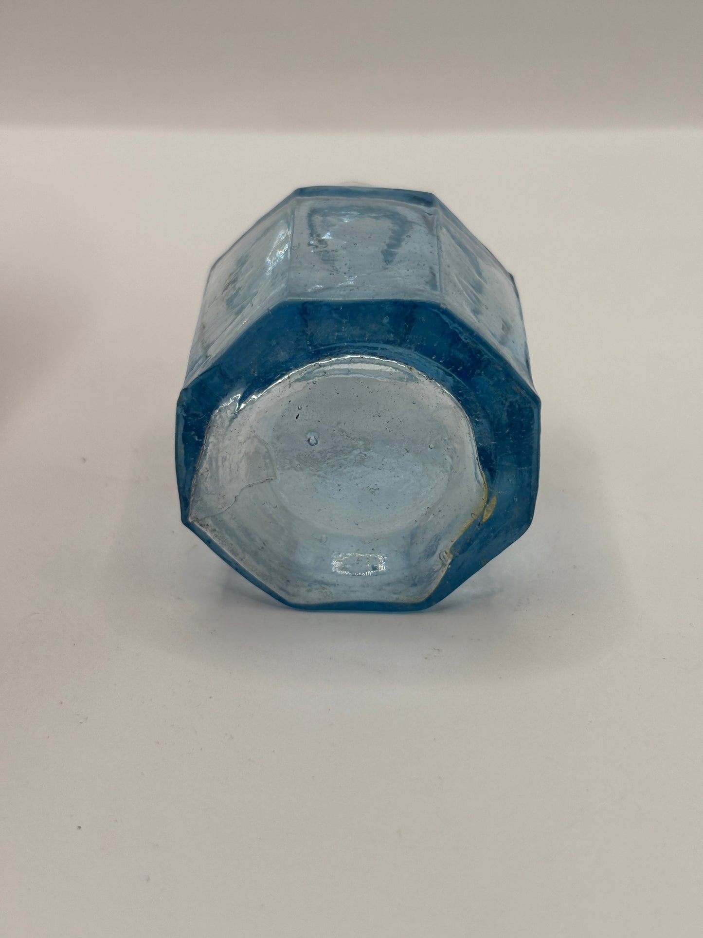 Old ice blue inkwell, ink bottle