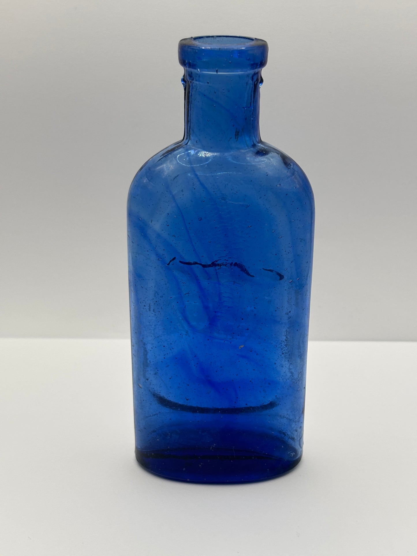 Old blue glass advertising chemist bottle, walfox brand