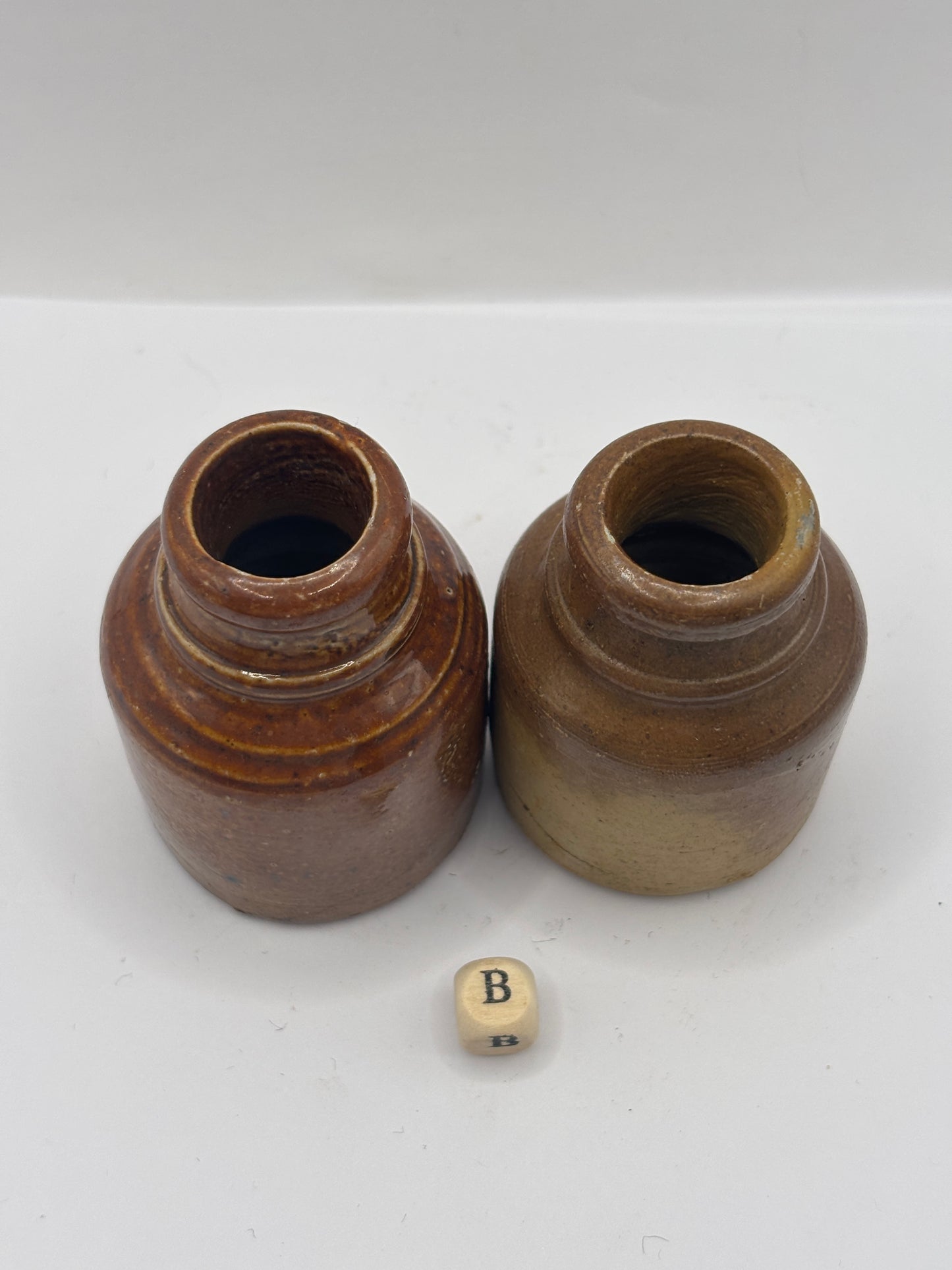 2 brown stoneware inkwells, ink bottles (B)