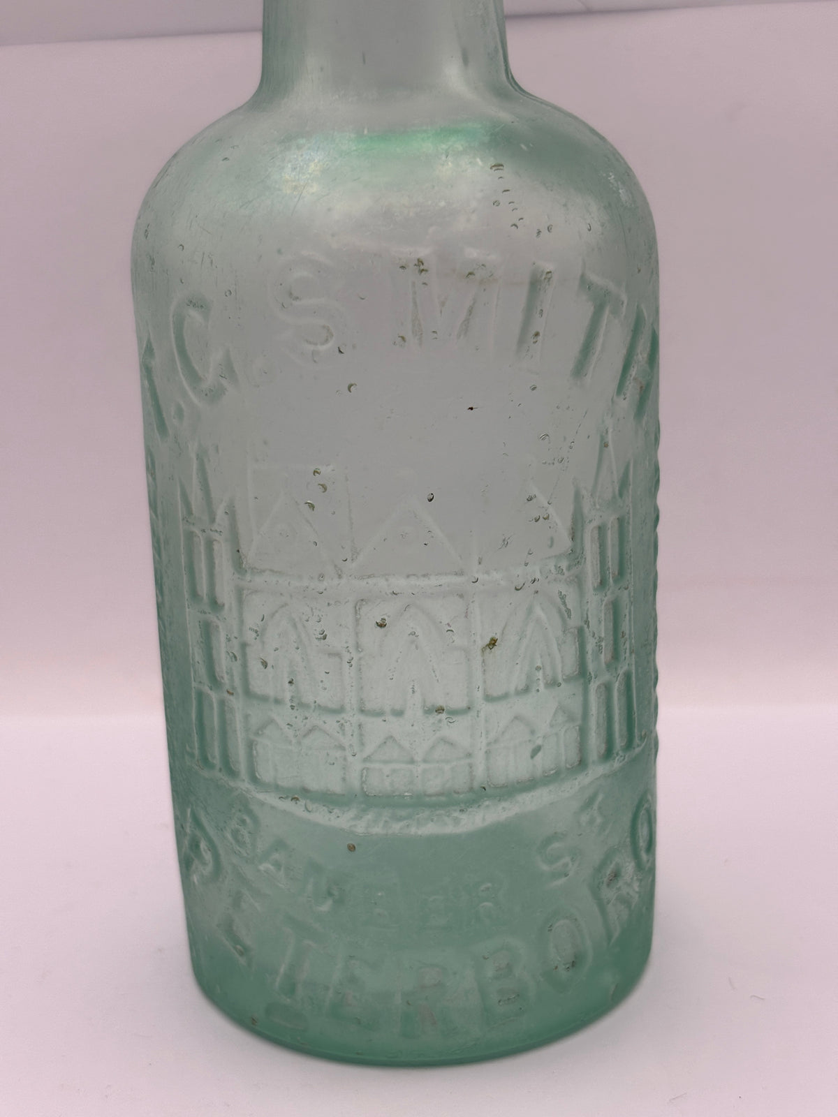 Old crusty advertising beer bottle, T.G Smith, Peterboro