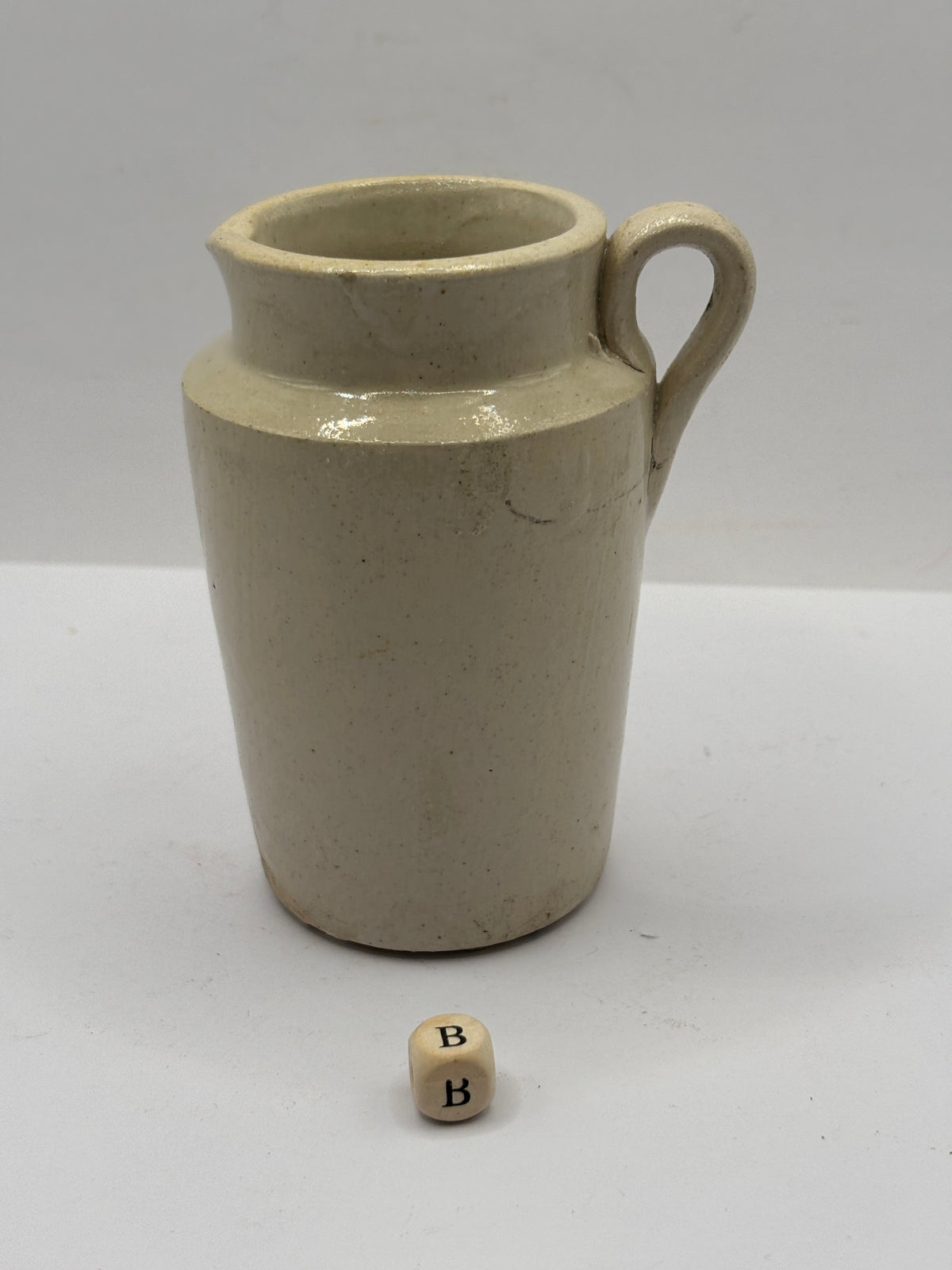 Old white stoneware cream jug (B)