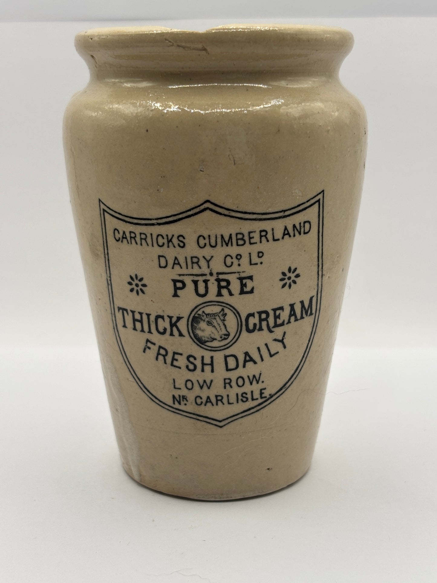 Old large advertising cream pot, Carricks pure thick cream with handle. Black print 11.5cms