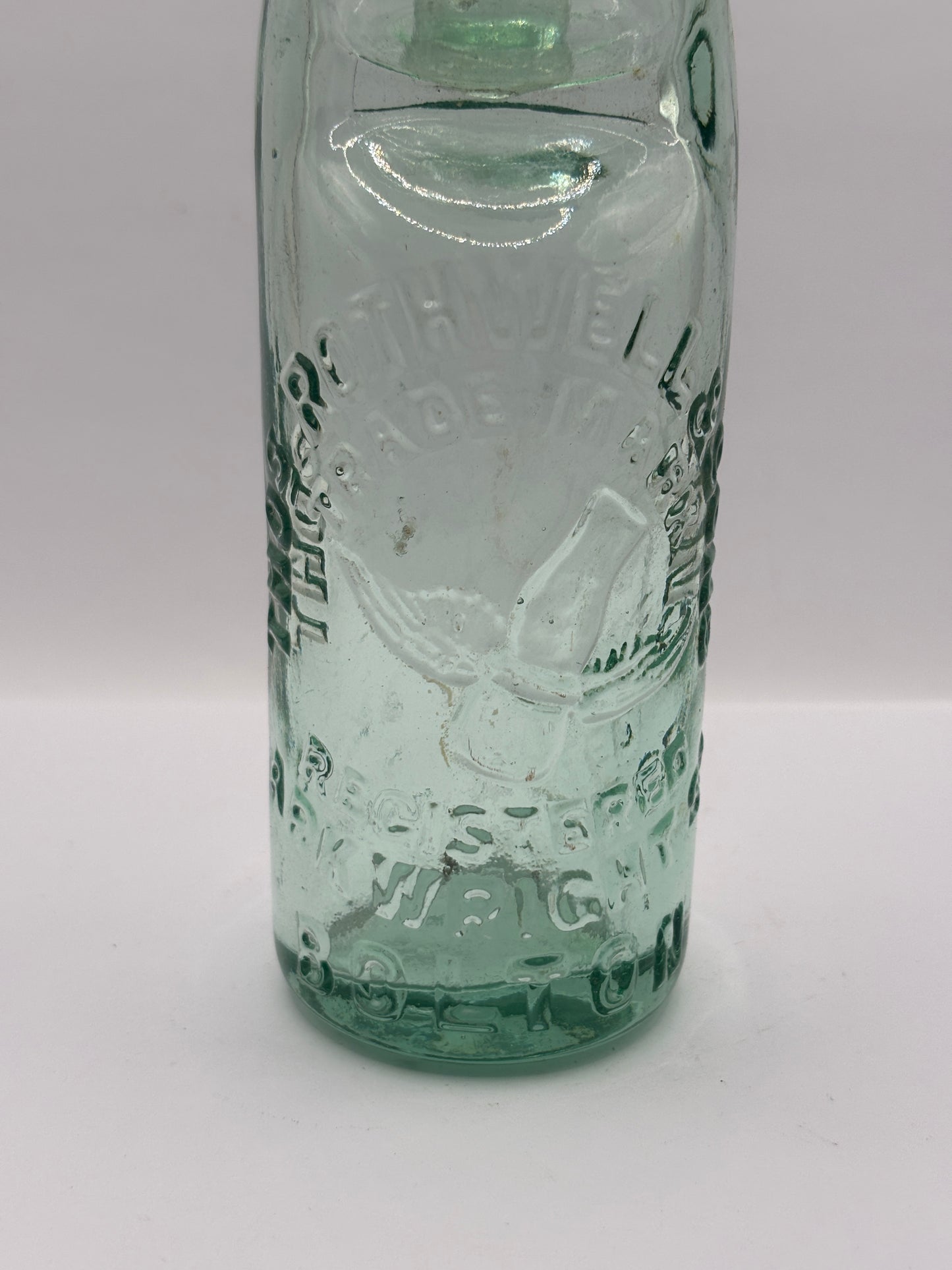 Old Bolton codd bottle, with marble. Thos Rothwell & sons
