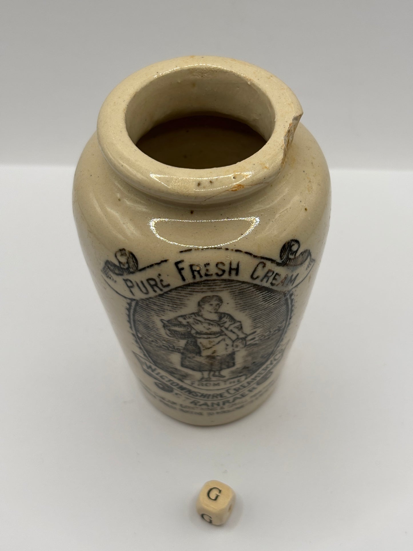 Old advertising cream pot, Rich preserved cream, Stranraer. Milk maid (G) damaged