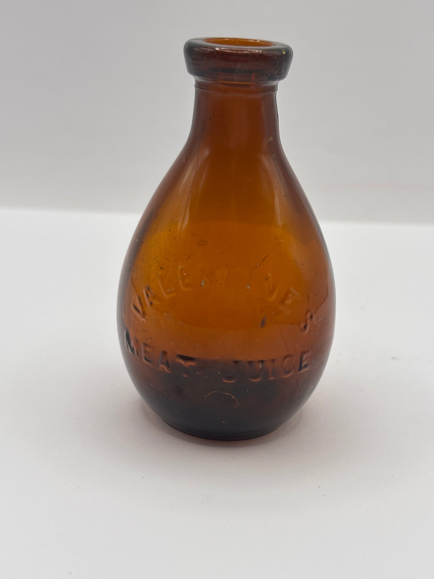 Old amber glass bottle, valentines meat juice