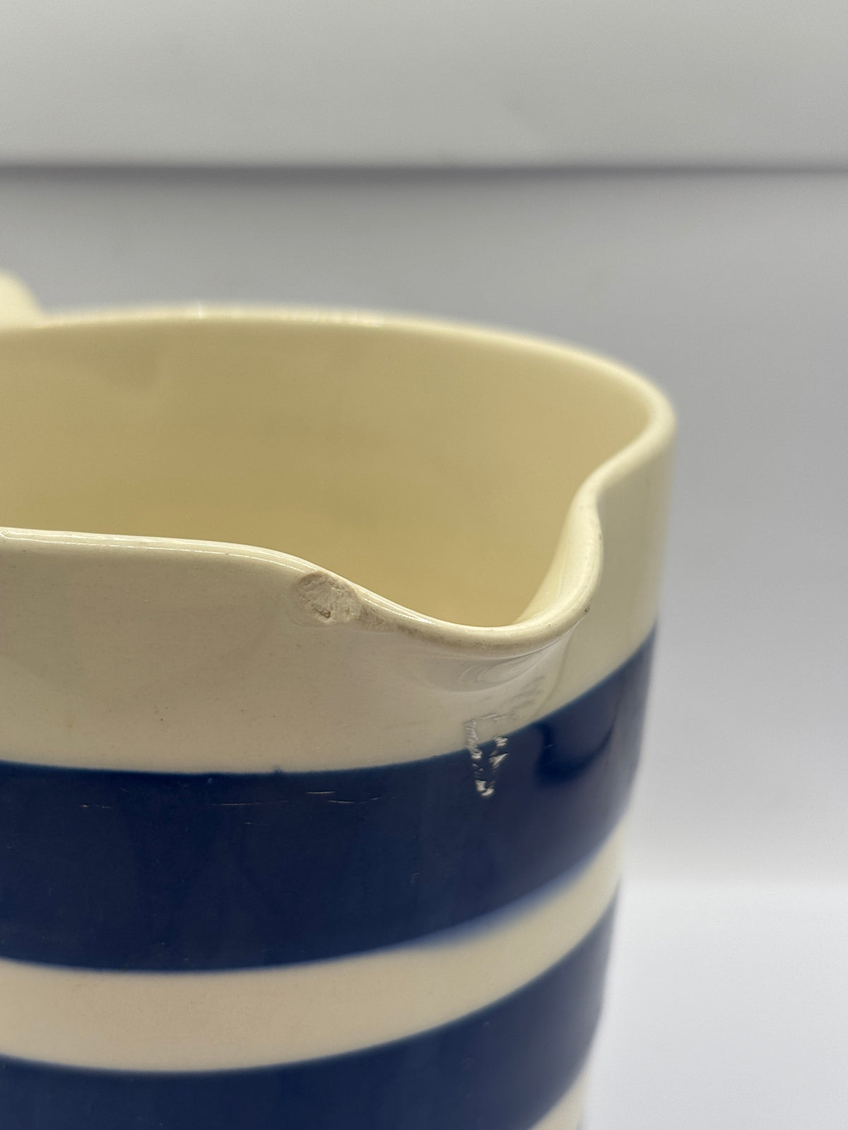Vintage blue & white striped milk jug
