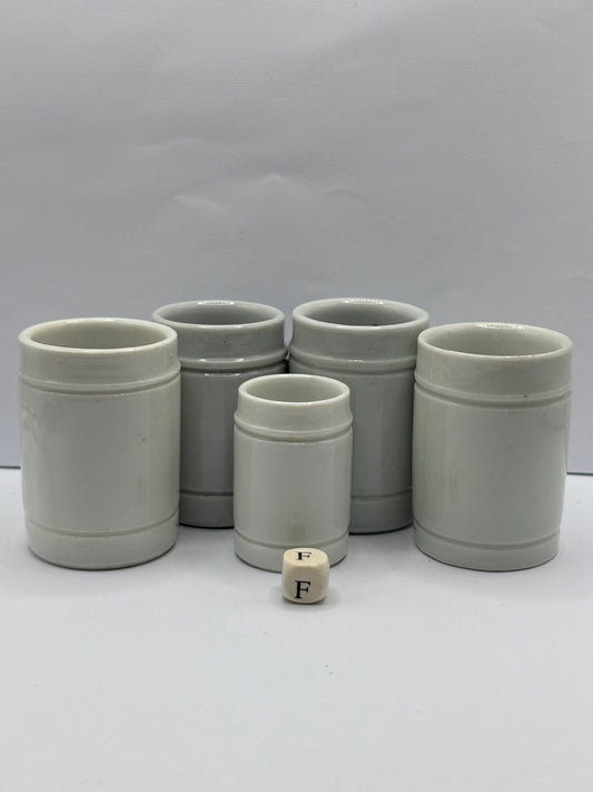 5 small white stoneware pots (F)