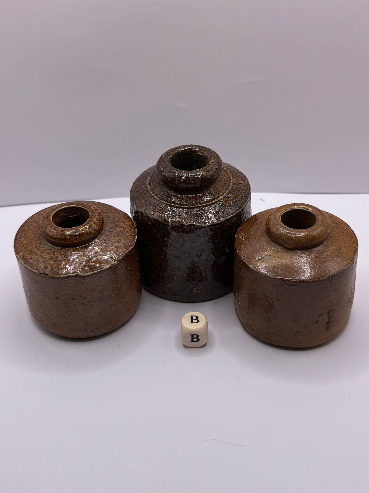 3 brown stoneware inkwells, pork pie inks (B)