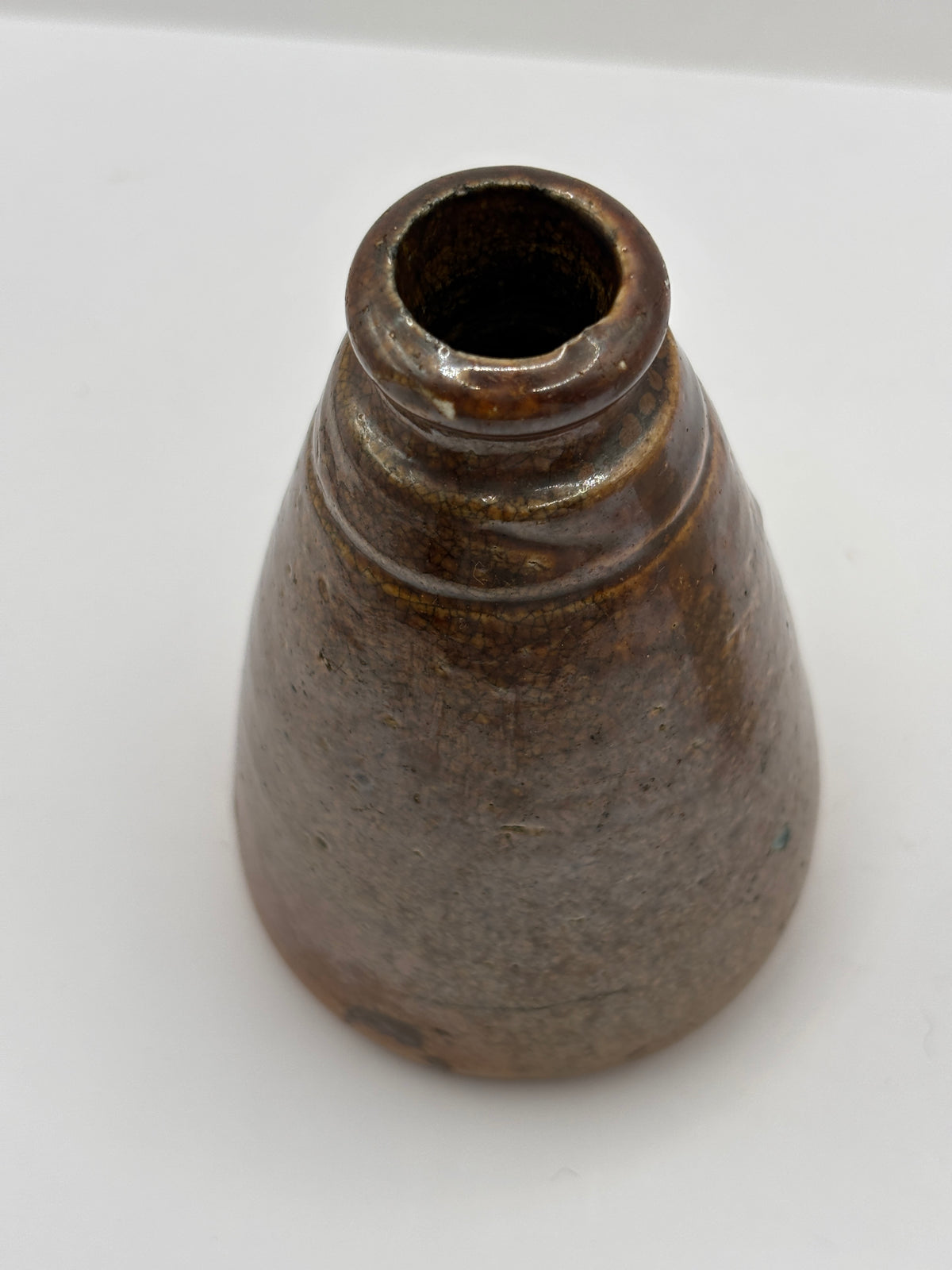 Old stoneware ink bottle, inkwell. Cone ink