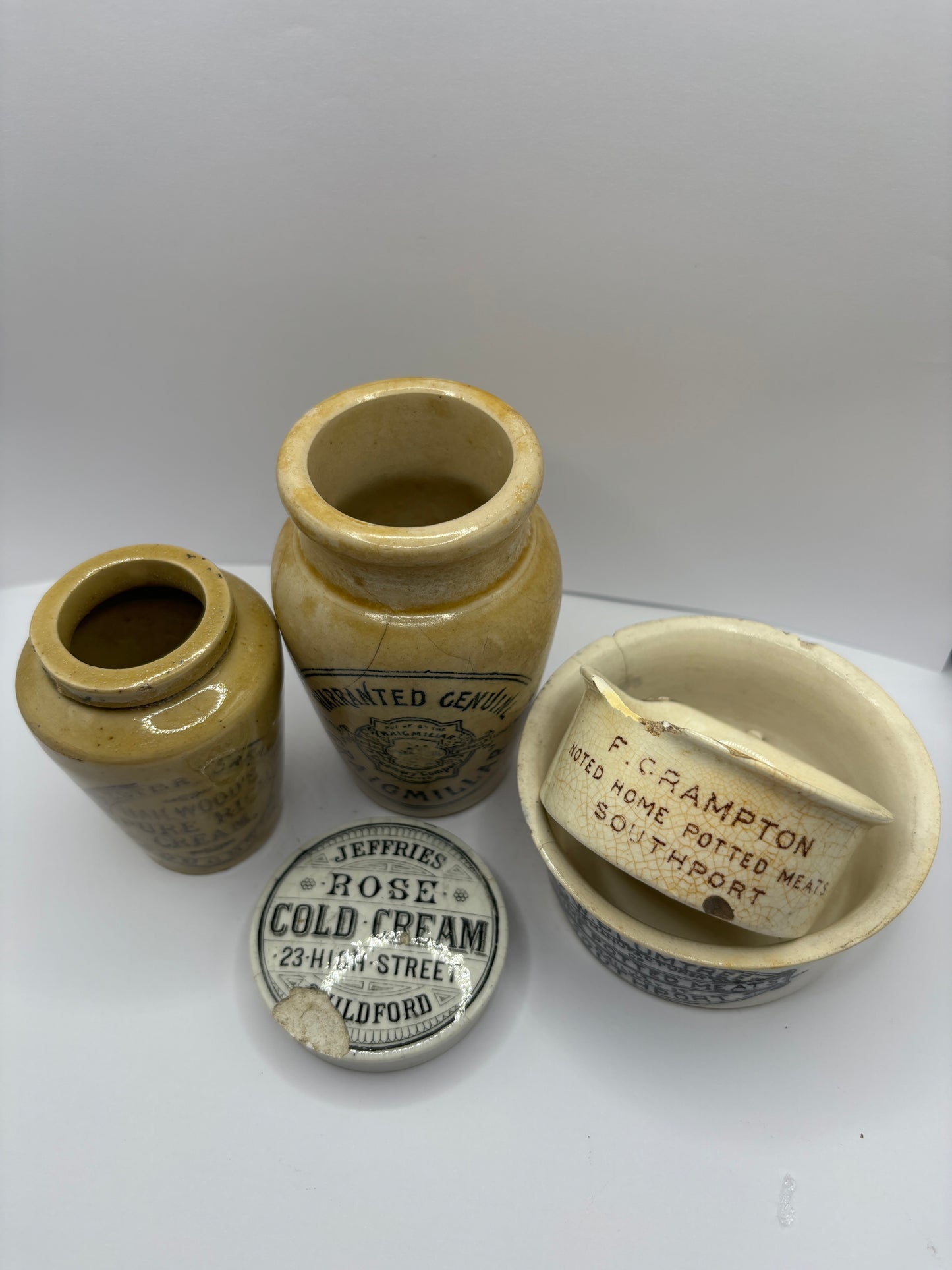 5 damaged advertising pots