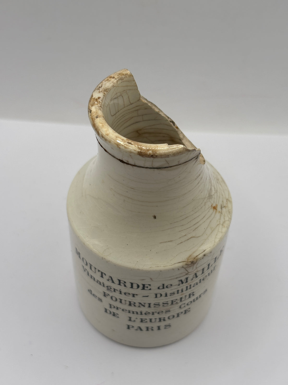 Old stoneware french mustard jar, moutarde de maille. Damaged