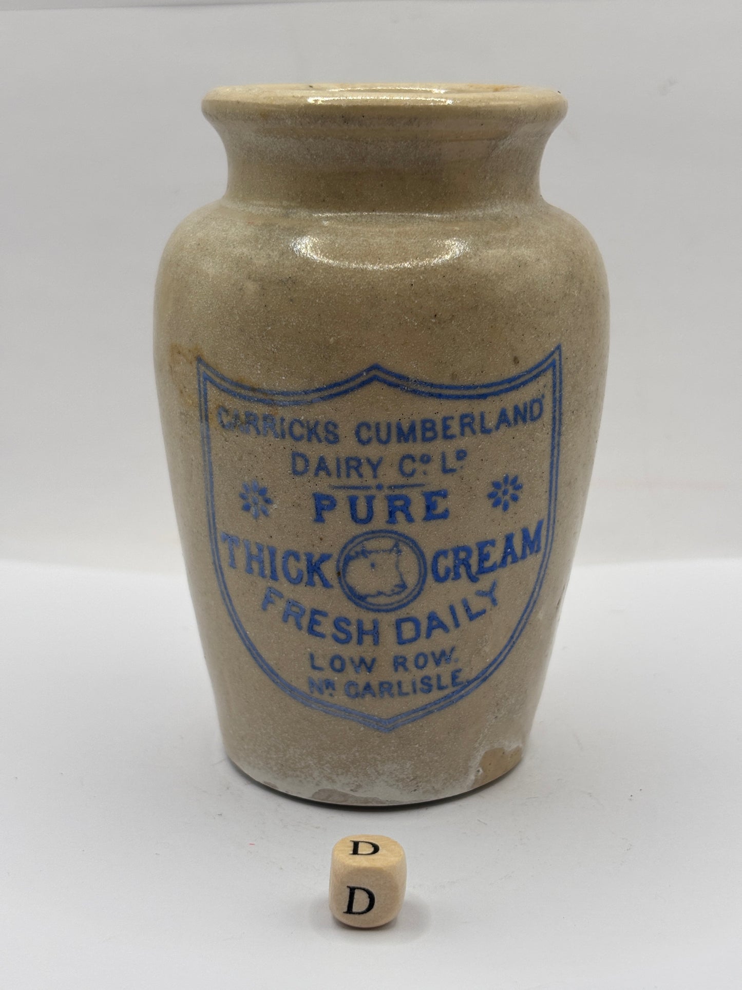 Old advertising cream pot, Carricks Cumberland dairy. Pure thick cream (D)