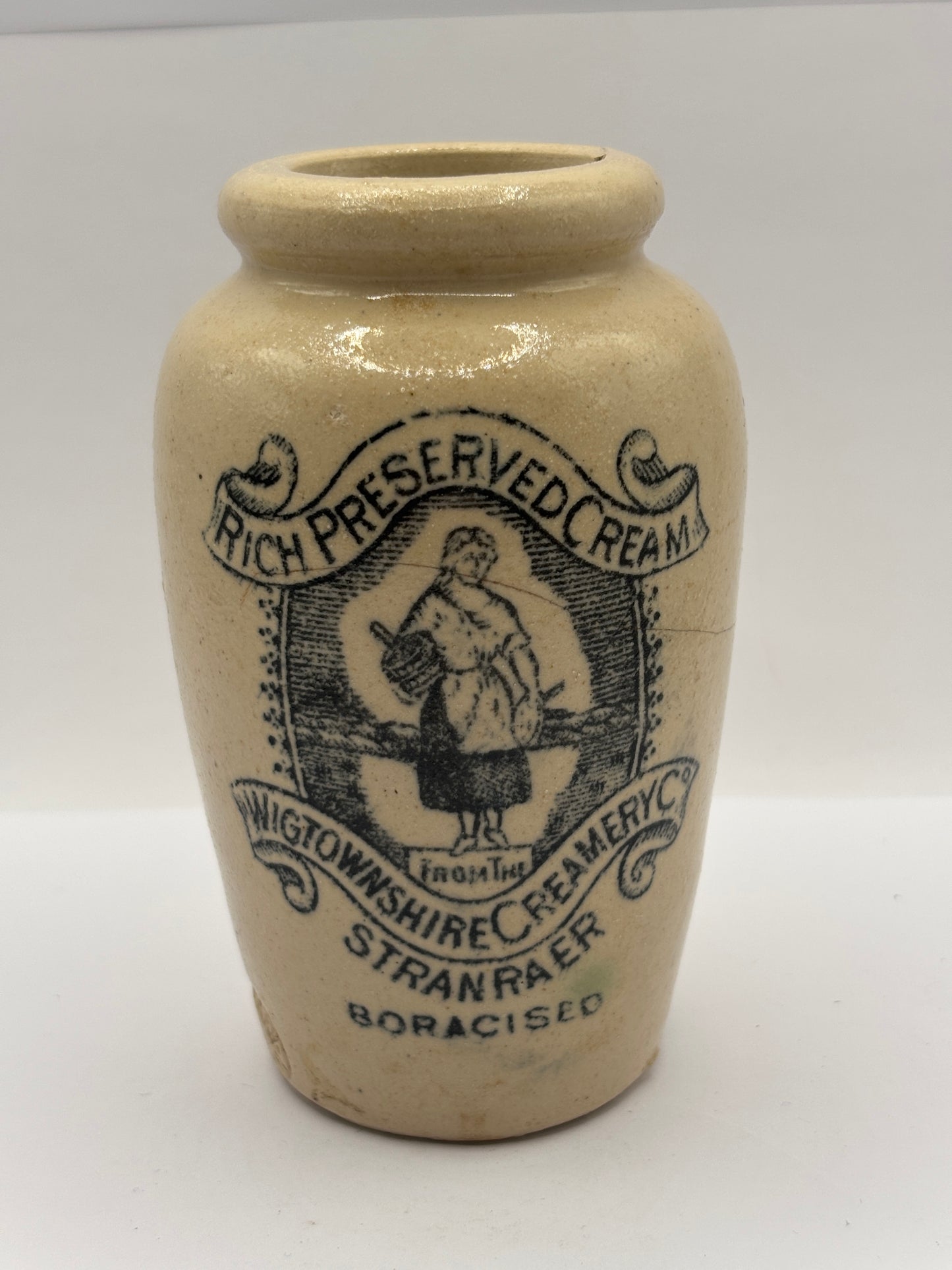 Old advertising cream pot, Rich preserved cream, Stranraer. Milk maid. damaged
